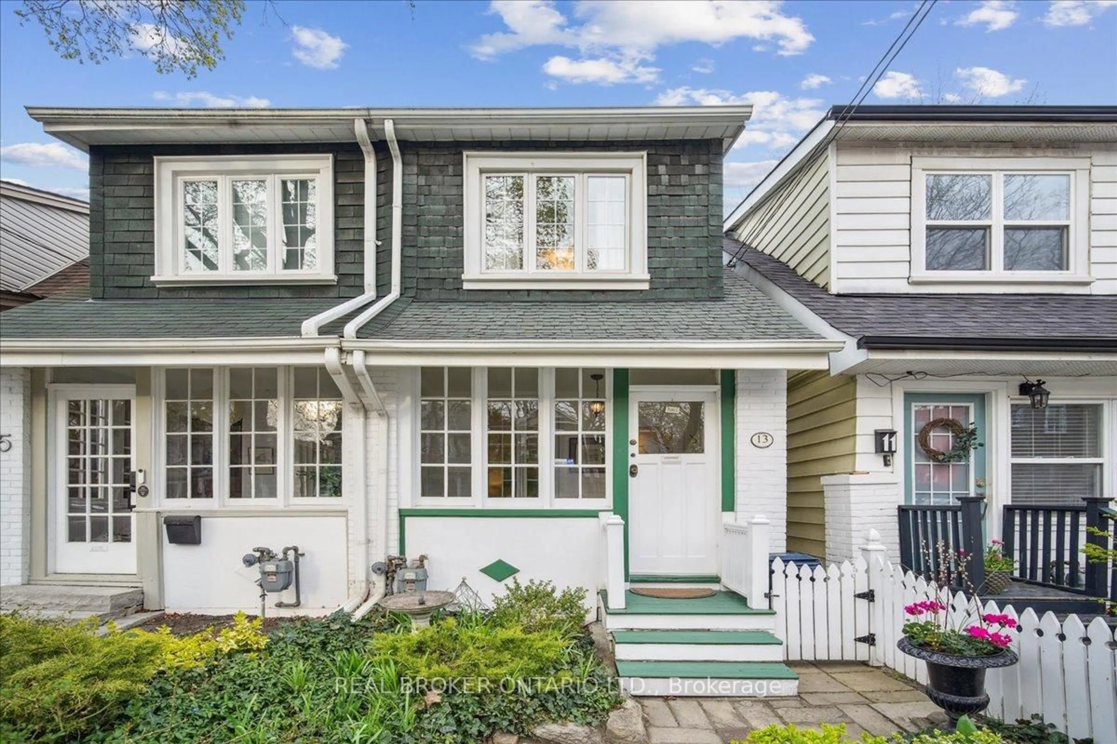 Home with vinyl exterior material, street for 13 Morton Rd, Toronto Ontario M4C 4N7