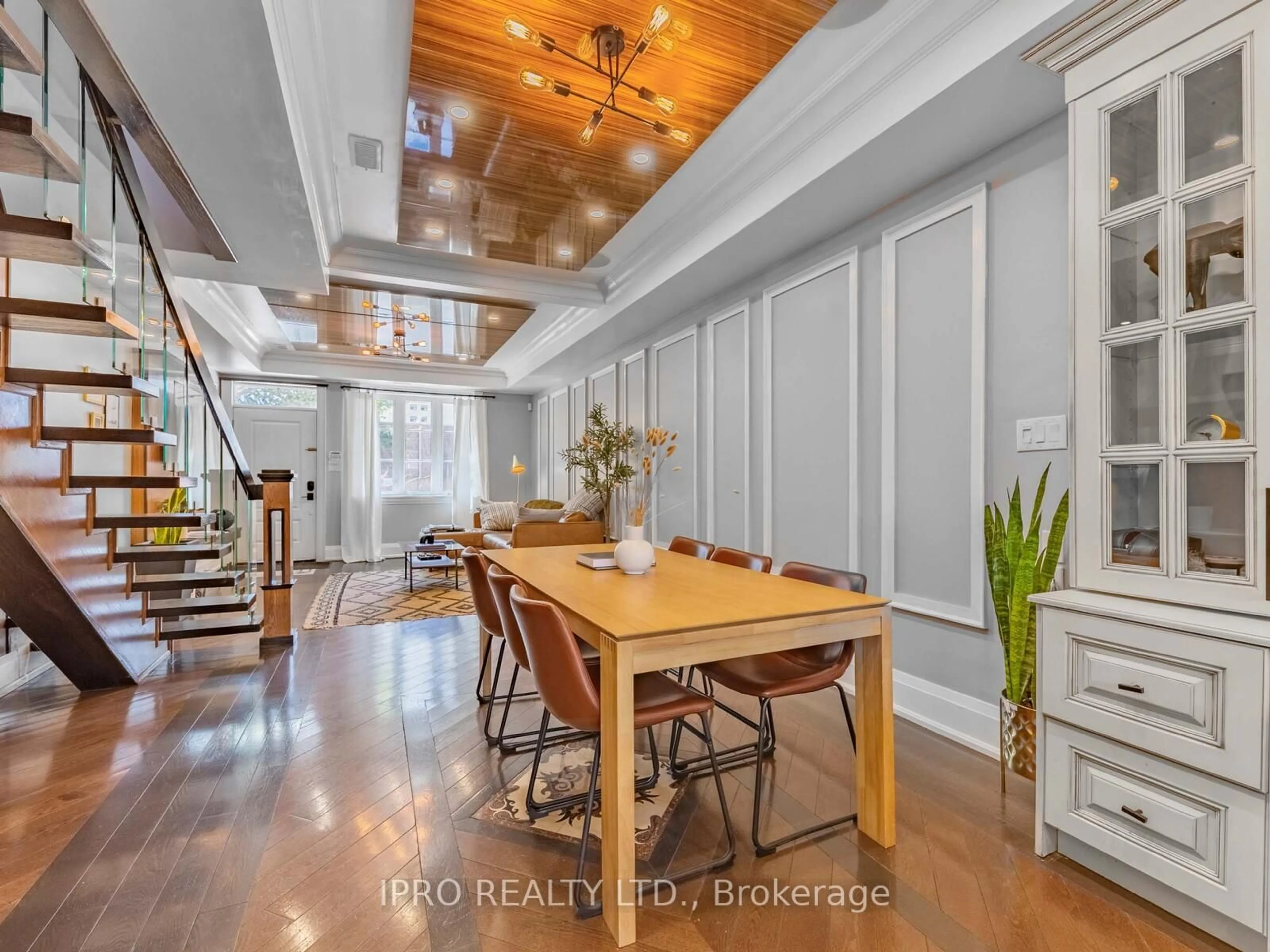 Dining room, wood/laminate floor for 27 Eastdale Ave, Toronto Ontario M4C 4Z8