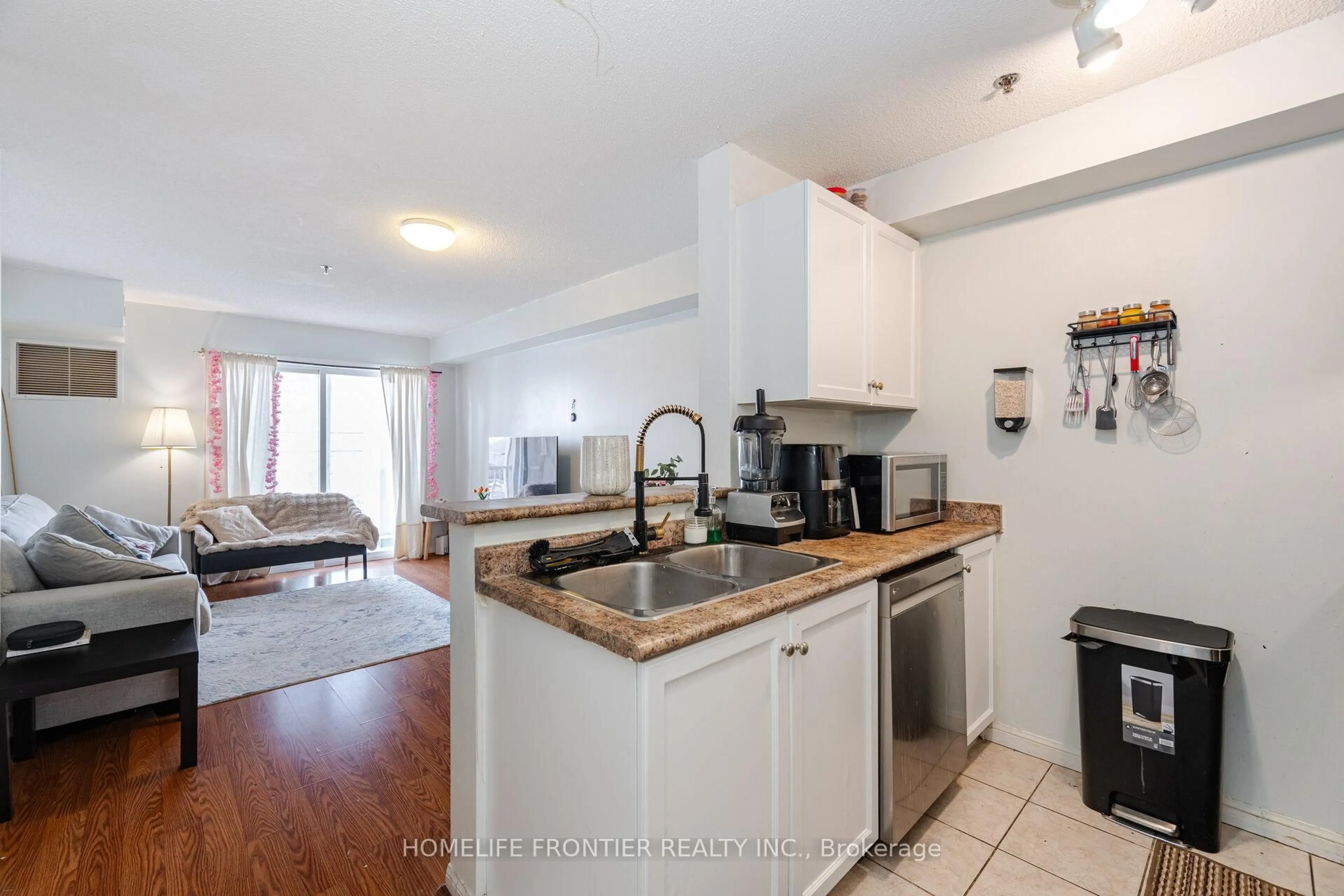 Open concept kitchen, unknown for 5225 Finch Ave #313, Toronto Ontario M1S 5W8