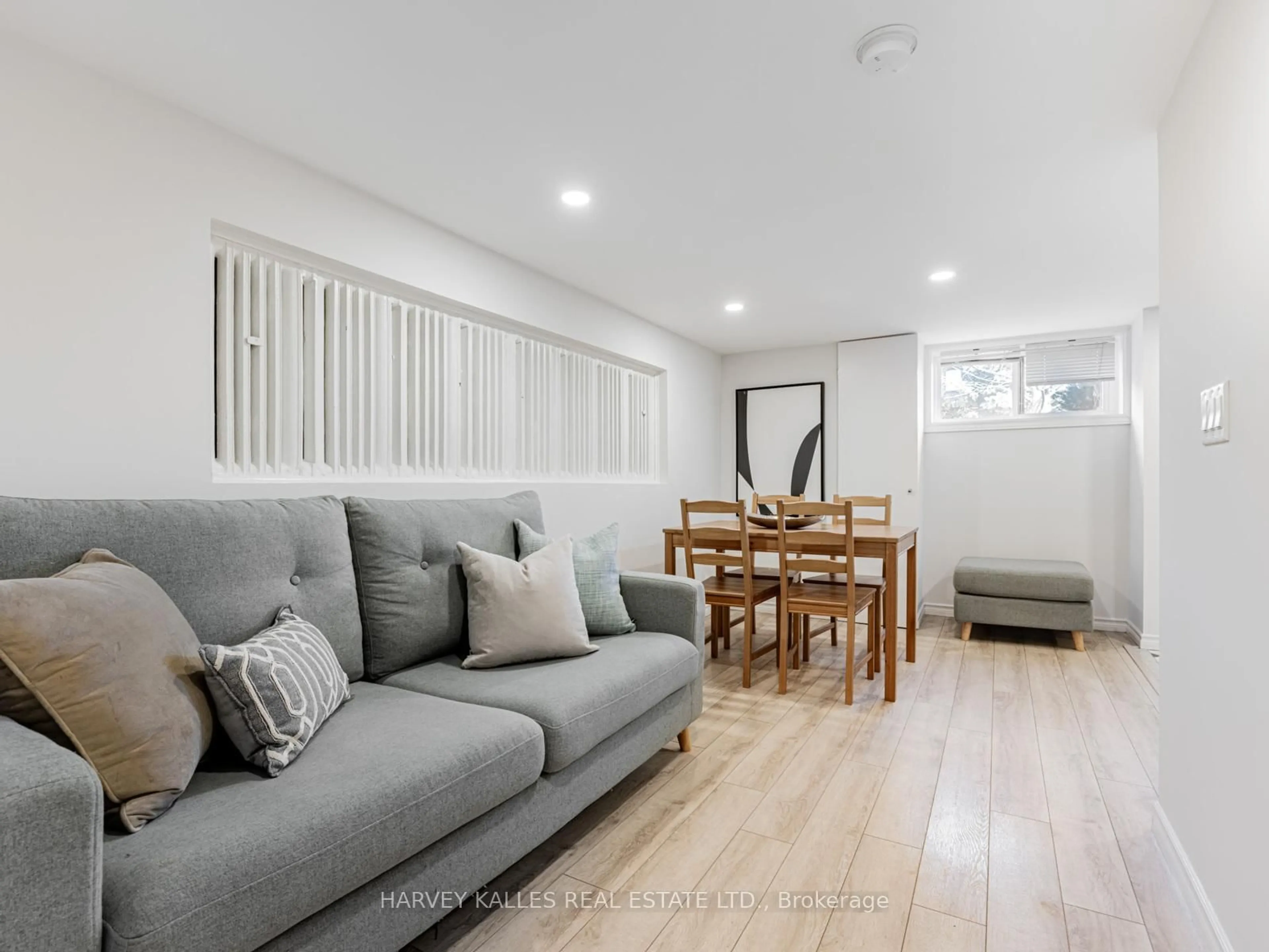 Living room with furniture, unknown for 511 Sammon Ave, Toronto Ontario M4J 2B3