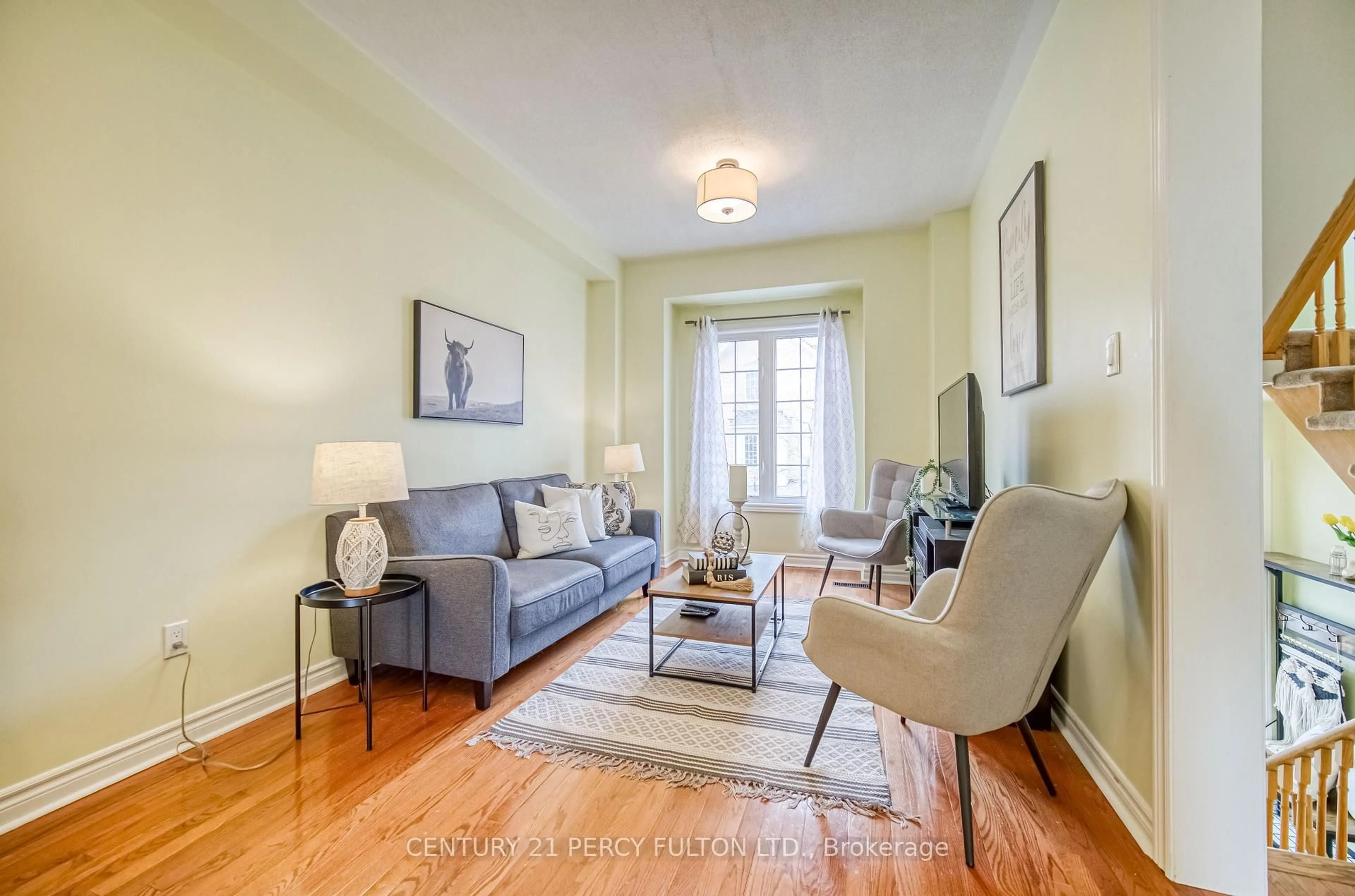 Living room with furniture, wood/laminate floor for 25 Annable Lane #34, Ajax Ontario L1S 7S6