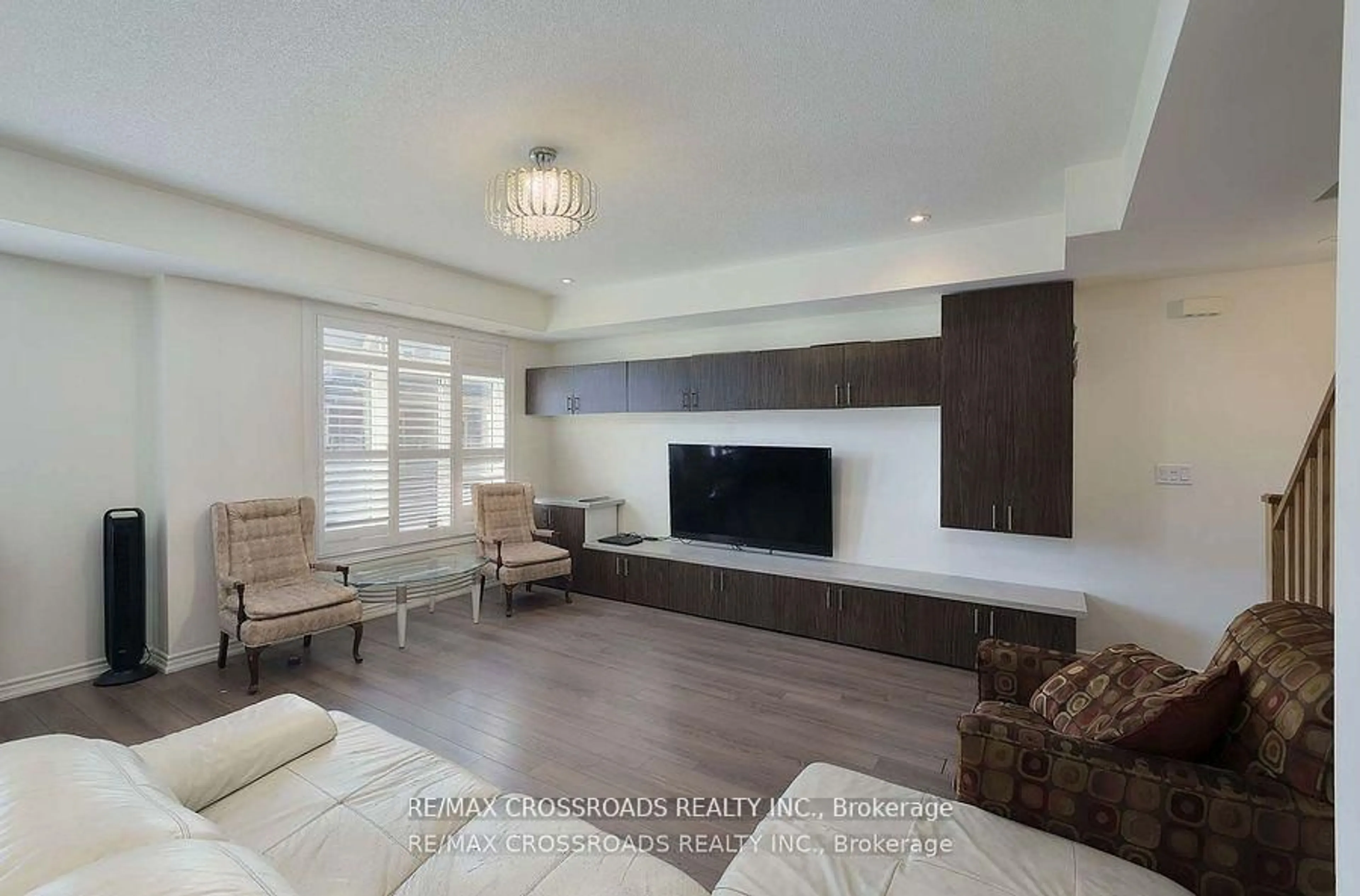 Living room with furniture, wood/laminate floor for 2726 William Jackson Dr #12, Pickering Ontario L1X 0E6