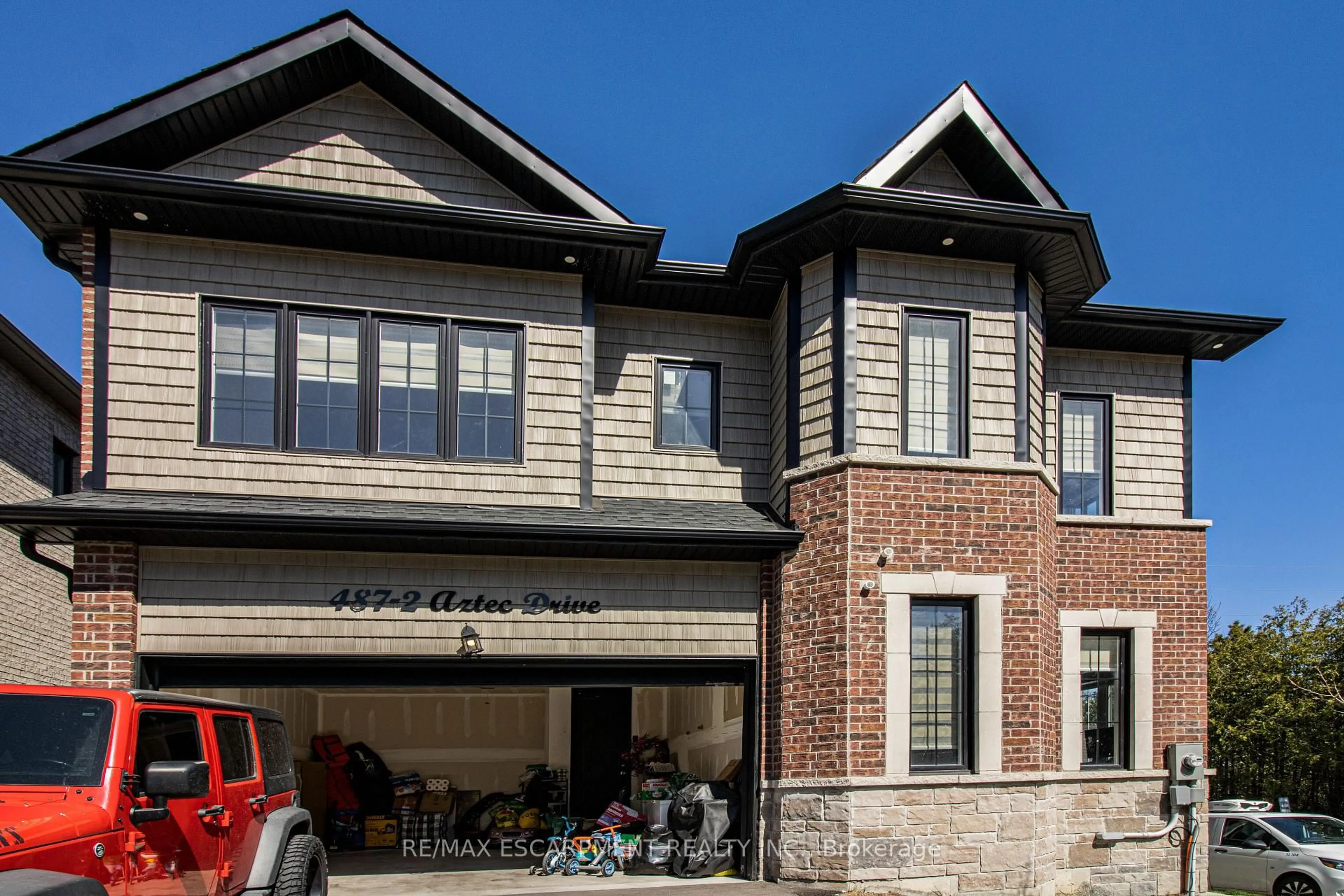 Home with brick exterior material, street for 487 Aztec Dr #2, Oshawa Ontario L1J 7S7