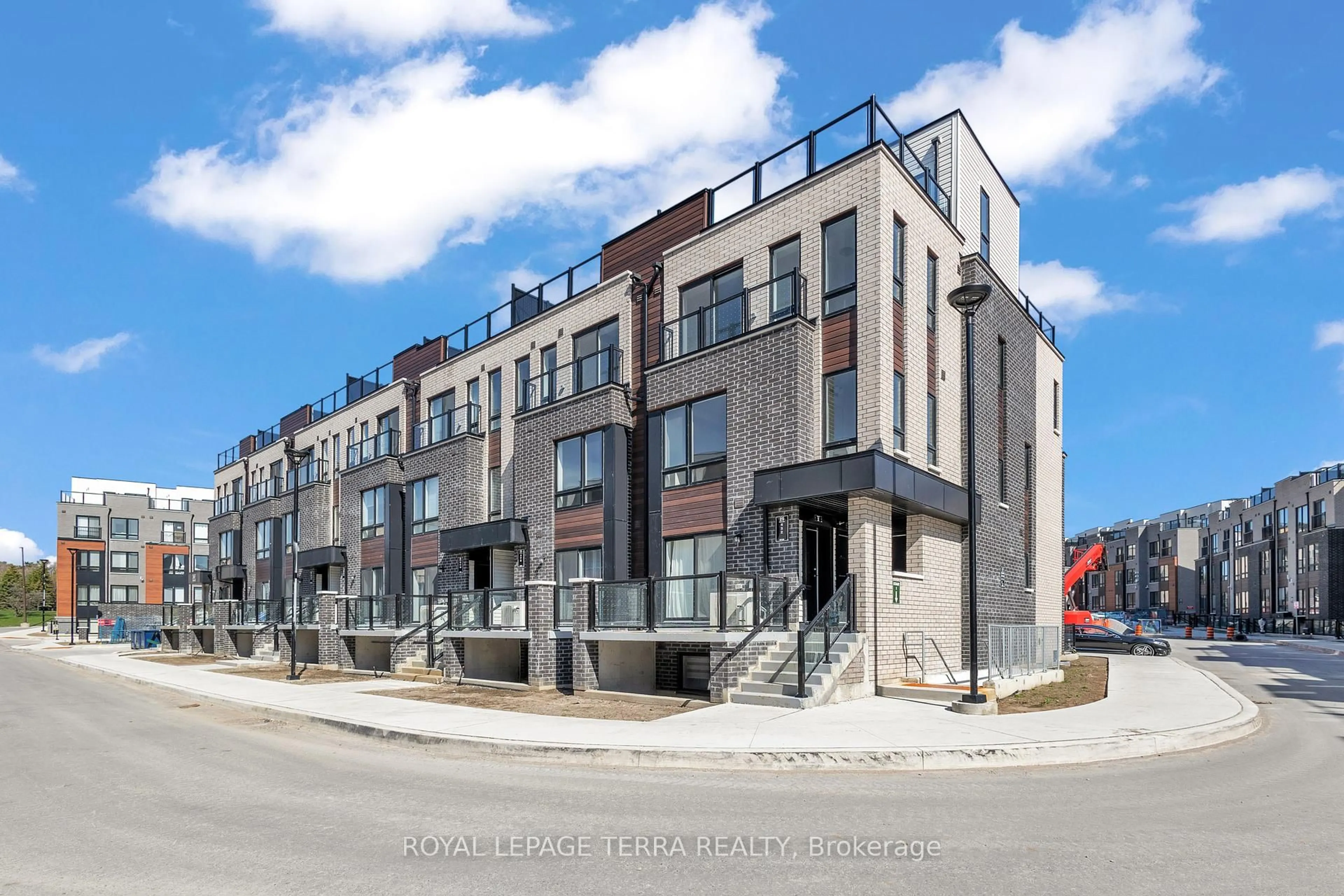 Home with brick exterior material, street for 25 Priya Lane #7, Toronto Ontario M1B 0E8
