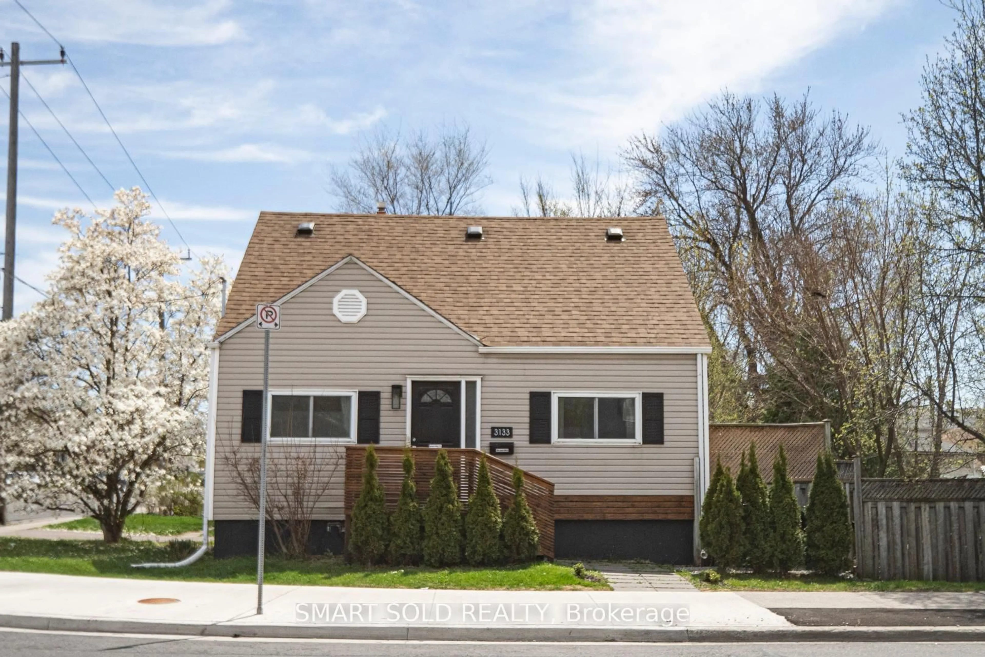 Home with vinyl exterior material, street for 3133 St. Clair Ave, Toronto Ontario M1L 1V2
