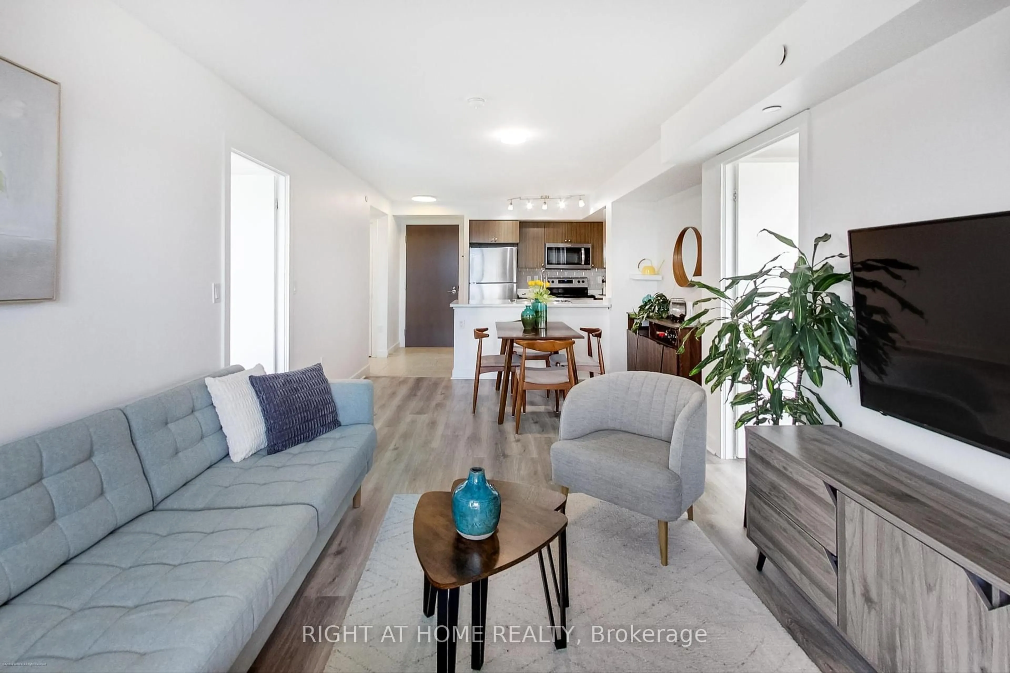Living room with furniture, unknown for 1346 Danforth Rd #706, Toronto Ontario M1J 0A9
