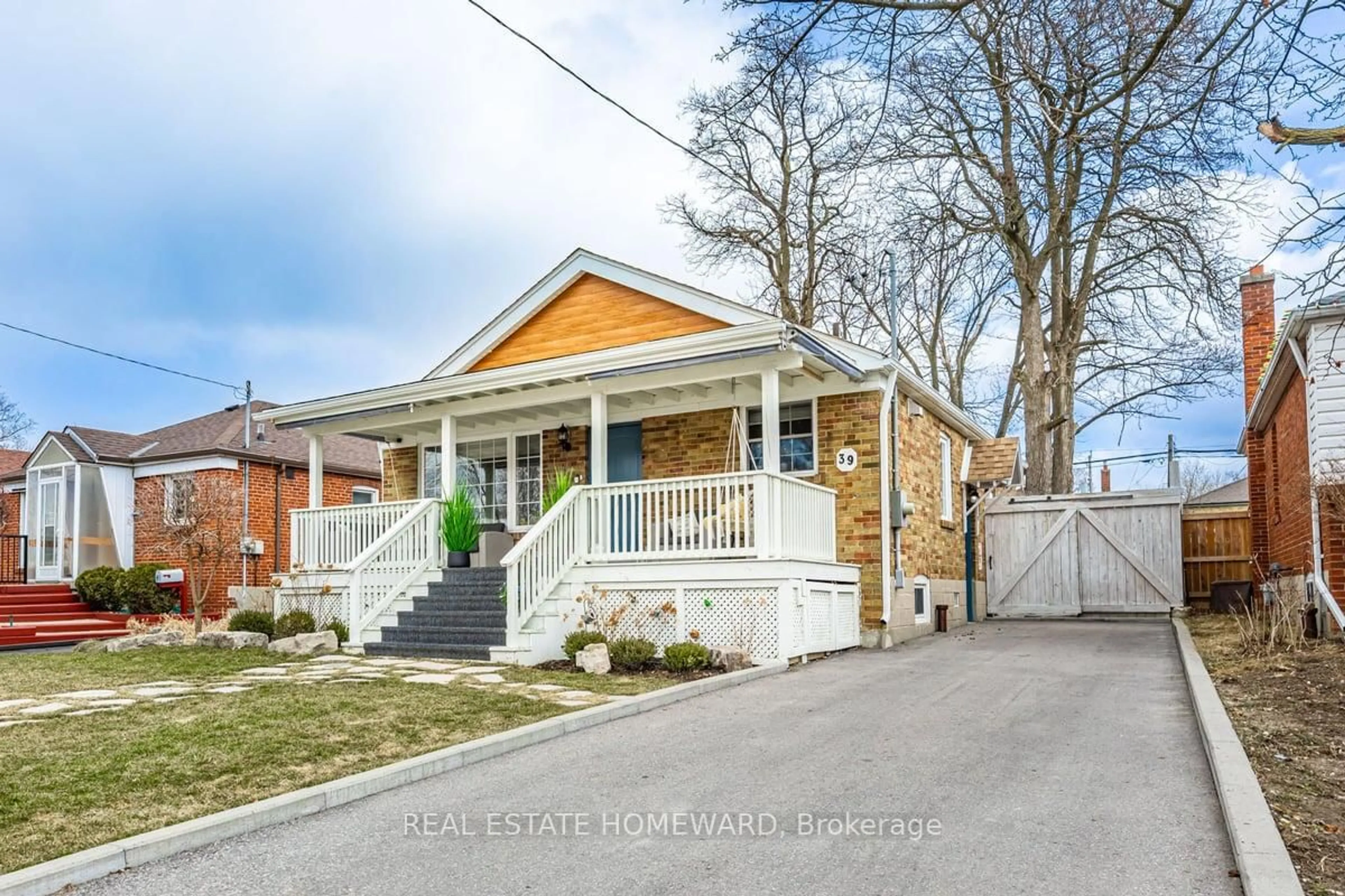 Home with brick exterior material, street for 39 Compton Dr, Toronto Ontario M1R 4A5