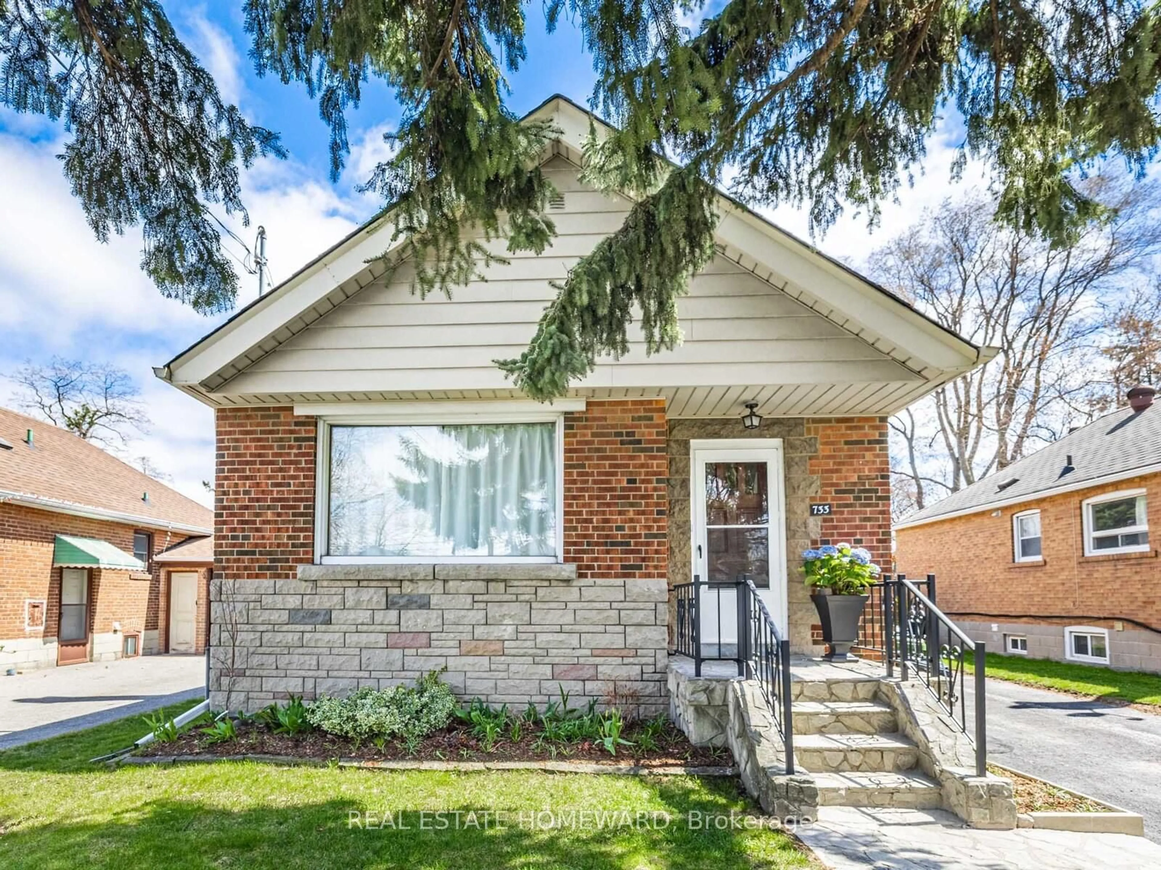 Home with brick exterior material, street for 733 Pharmacy Ave, Toronto Ontario M1L 3J4