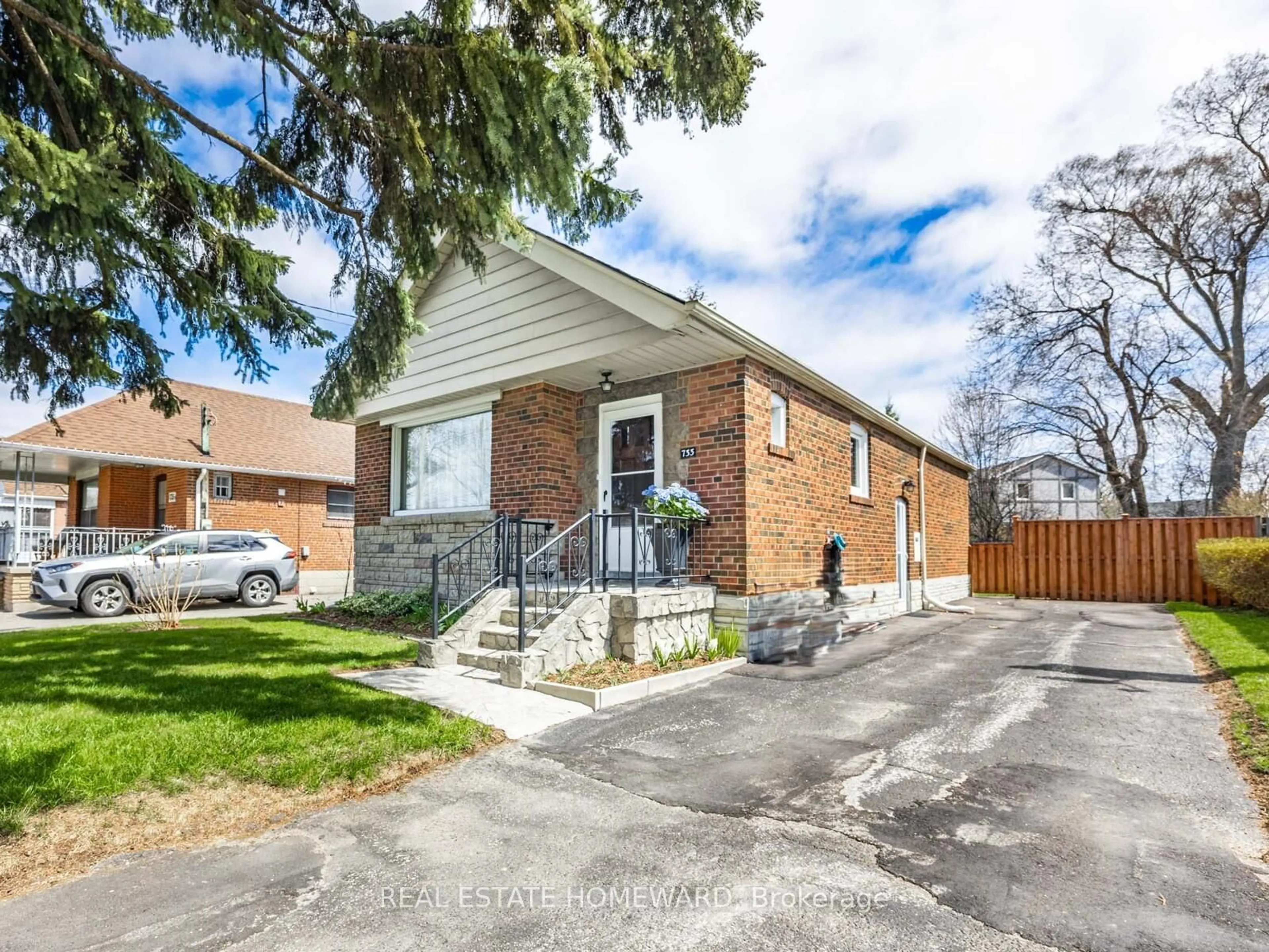 Home with brick exterior material, street for 733 Pharmacy Ave, Toronto Ontario M1L 3J4