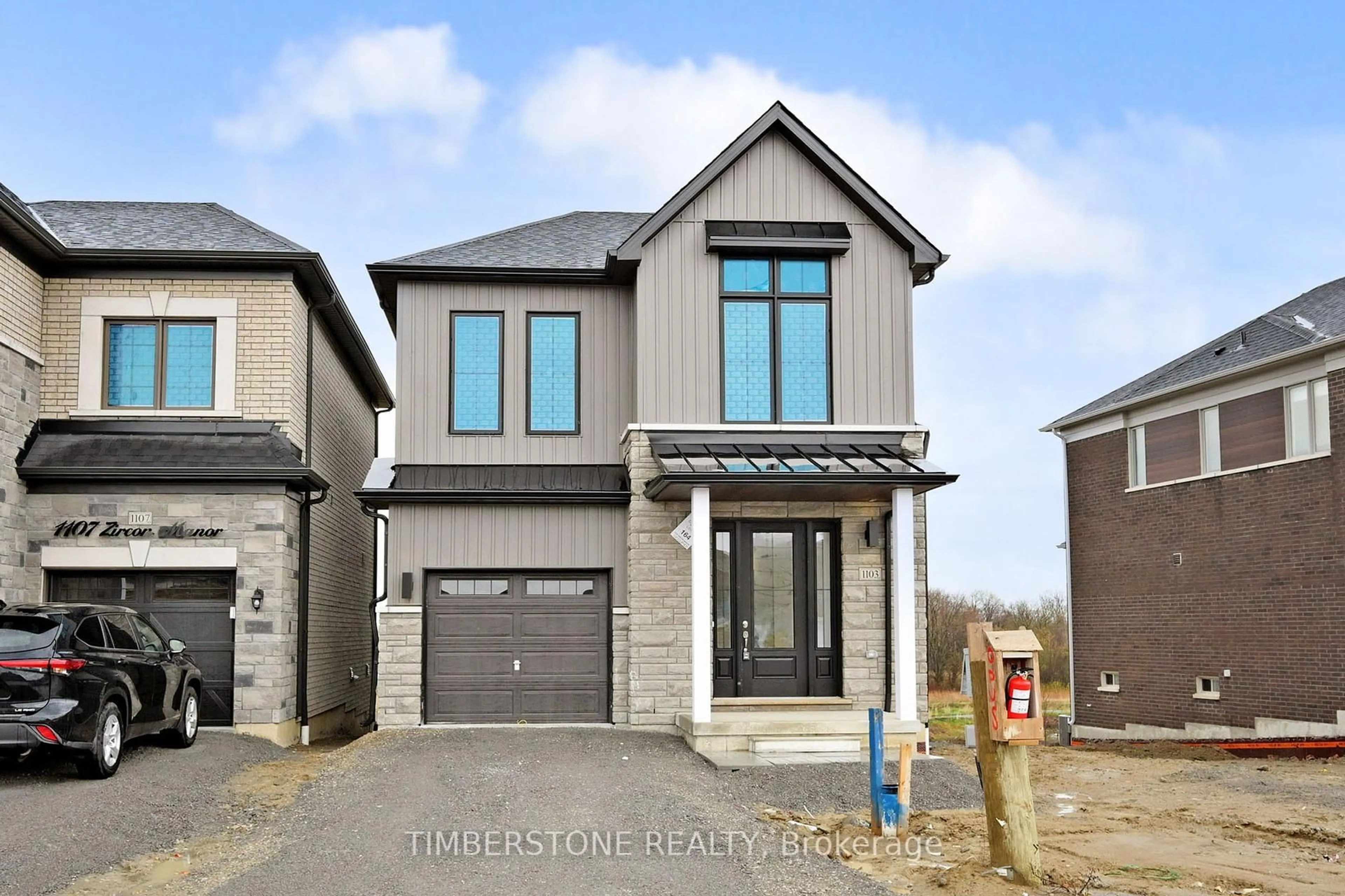 Home with brick exterior material, street for 1103 Zircon Manr, Pickering Ontario L1X 0P9