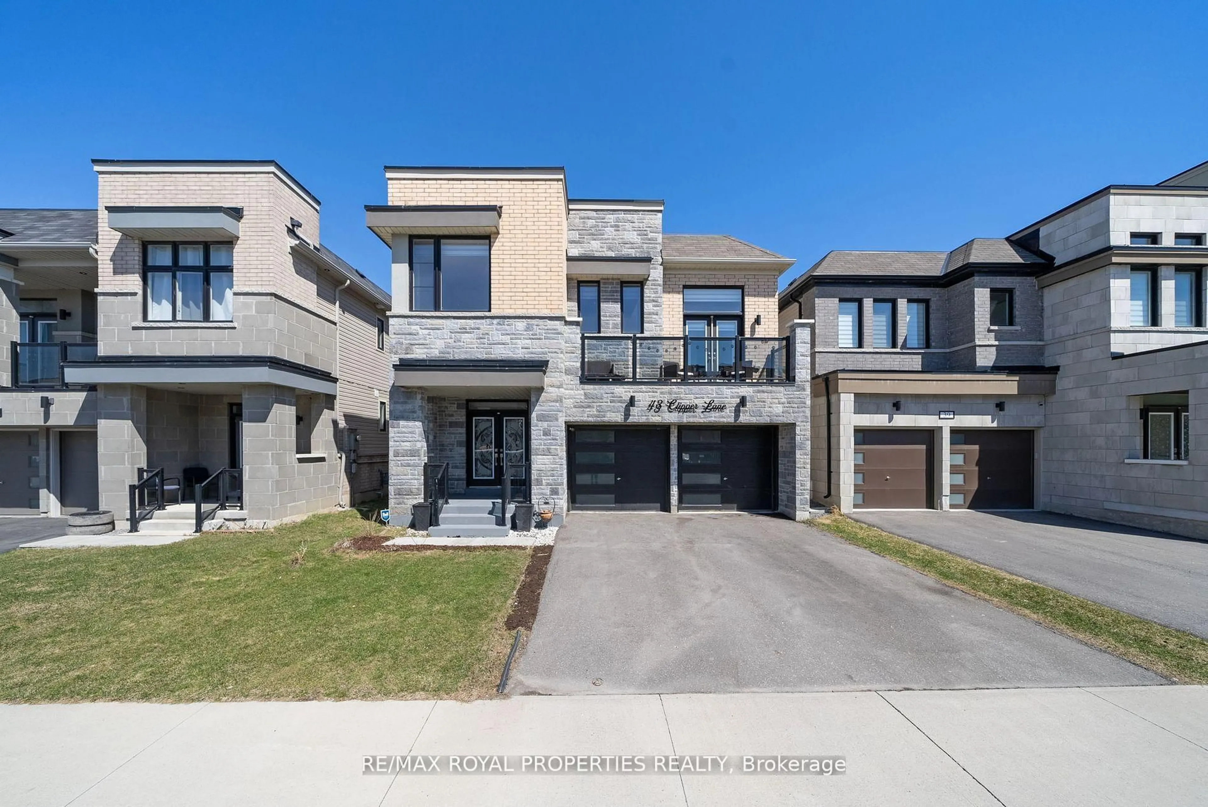 Home with brick exterior material, street for 43 Clipper Lane, Clarington Ontario L1C 4B1