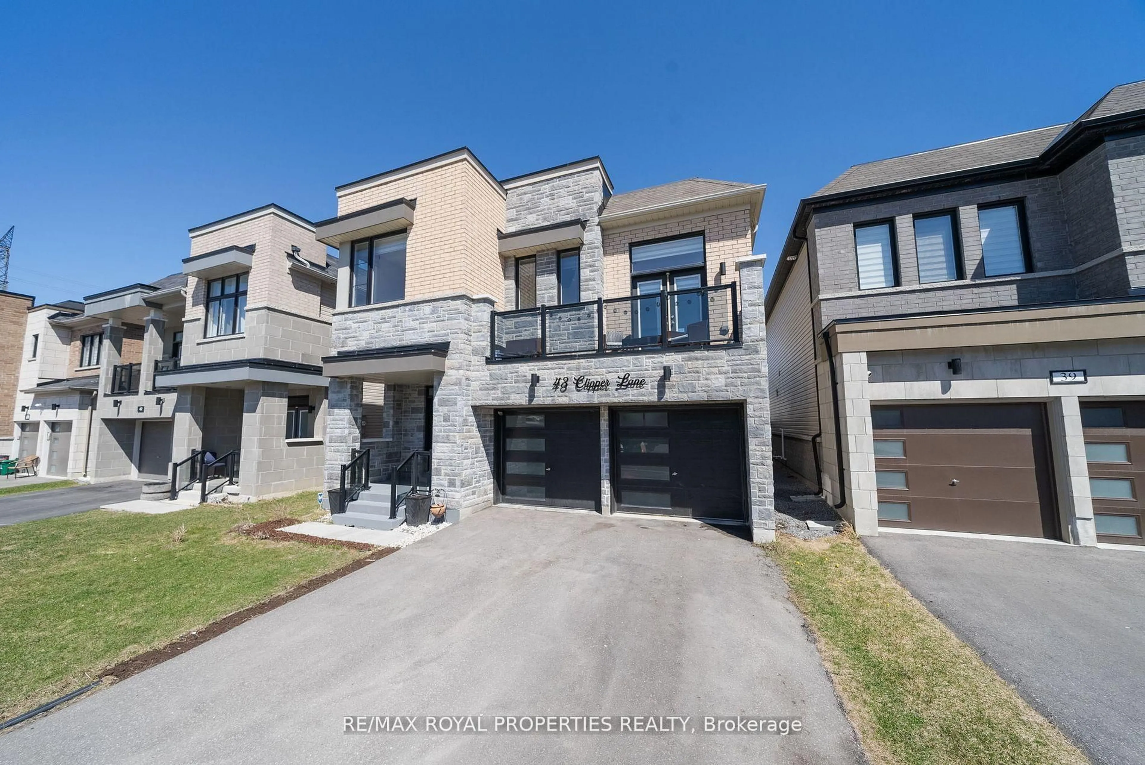 Home with brick exterior material, street for 43 Clipper Lane, Clarington Ontario L1C 4B1