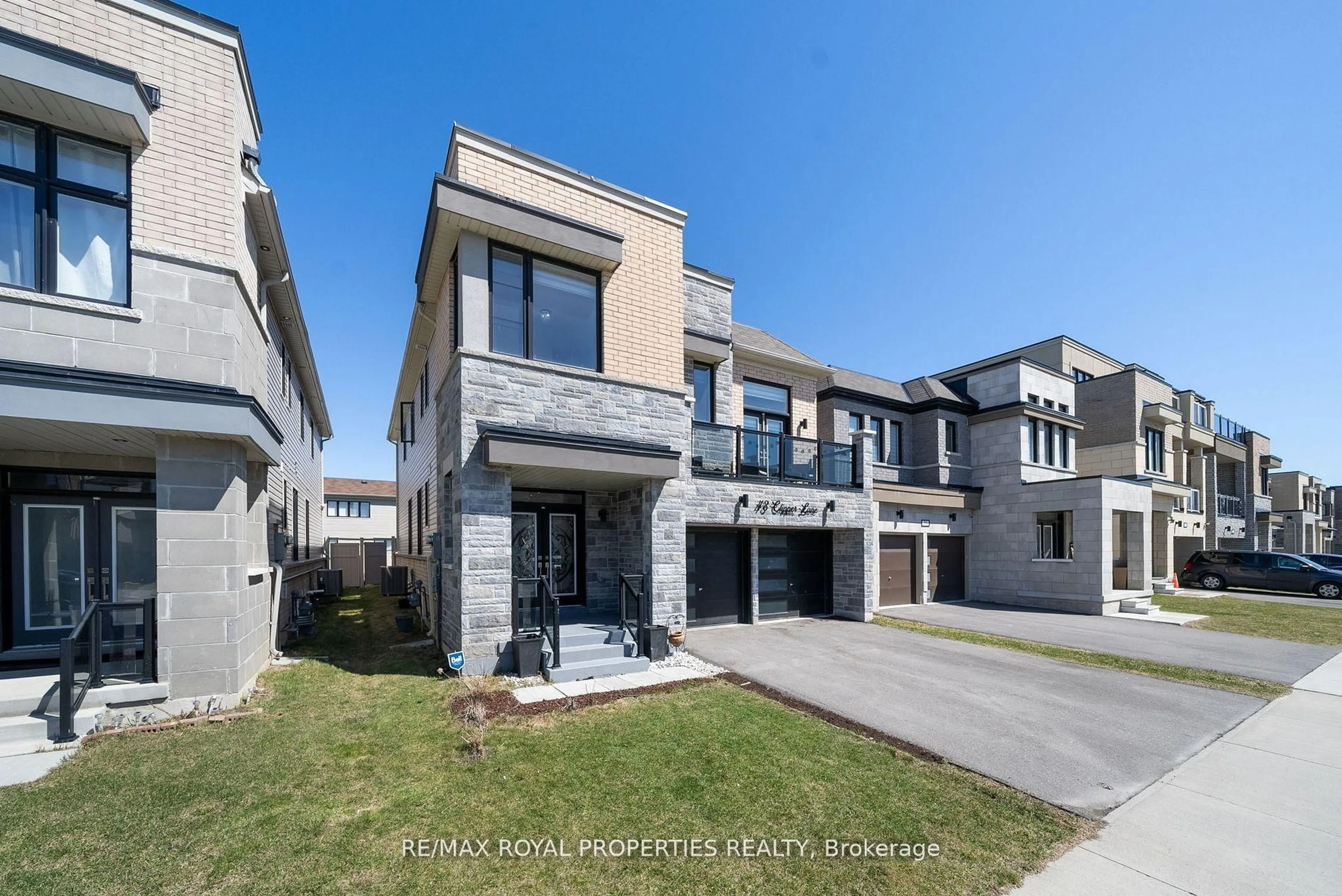 Home with brick exterior material, street for 43 Clipper Lane, Clarington Ontario L1C 4B1
