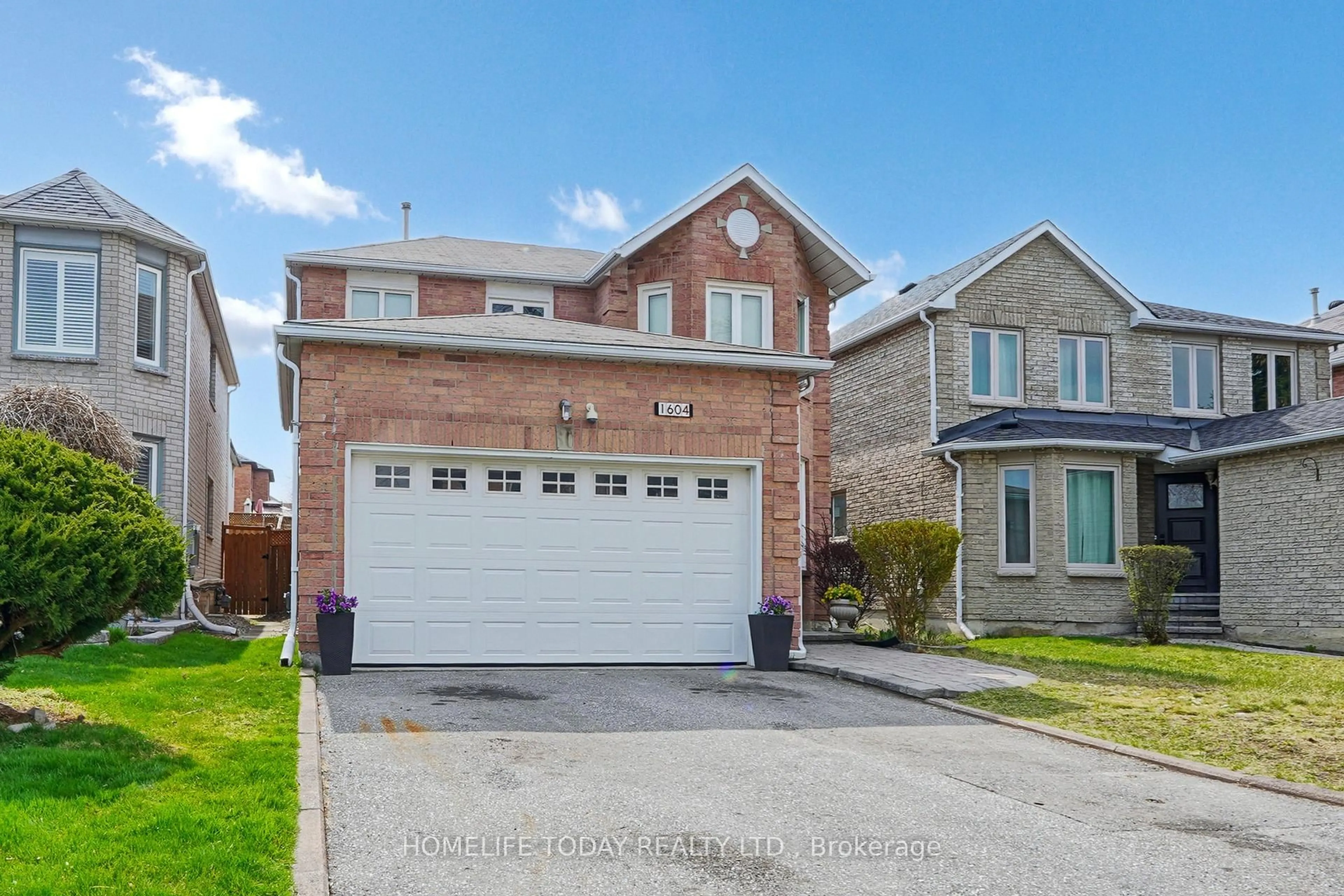 Home with brick exterior material, street for 1604 Deerbrook Dr, Pickering Ontario L1V 5B7