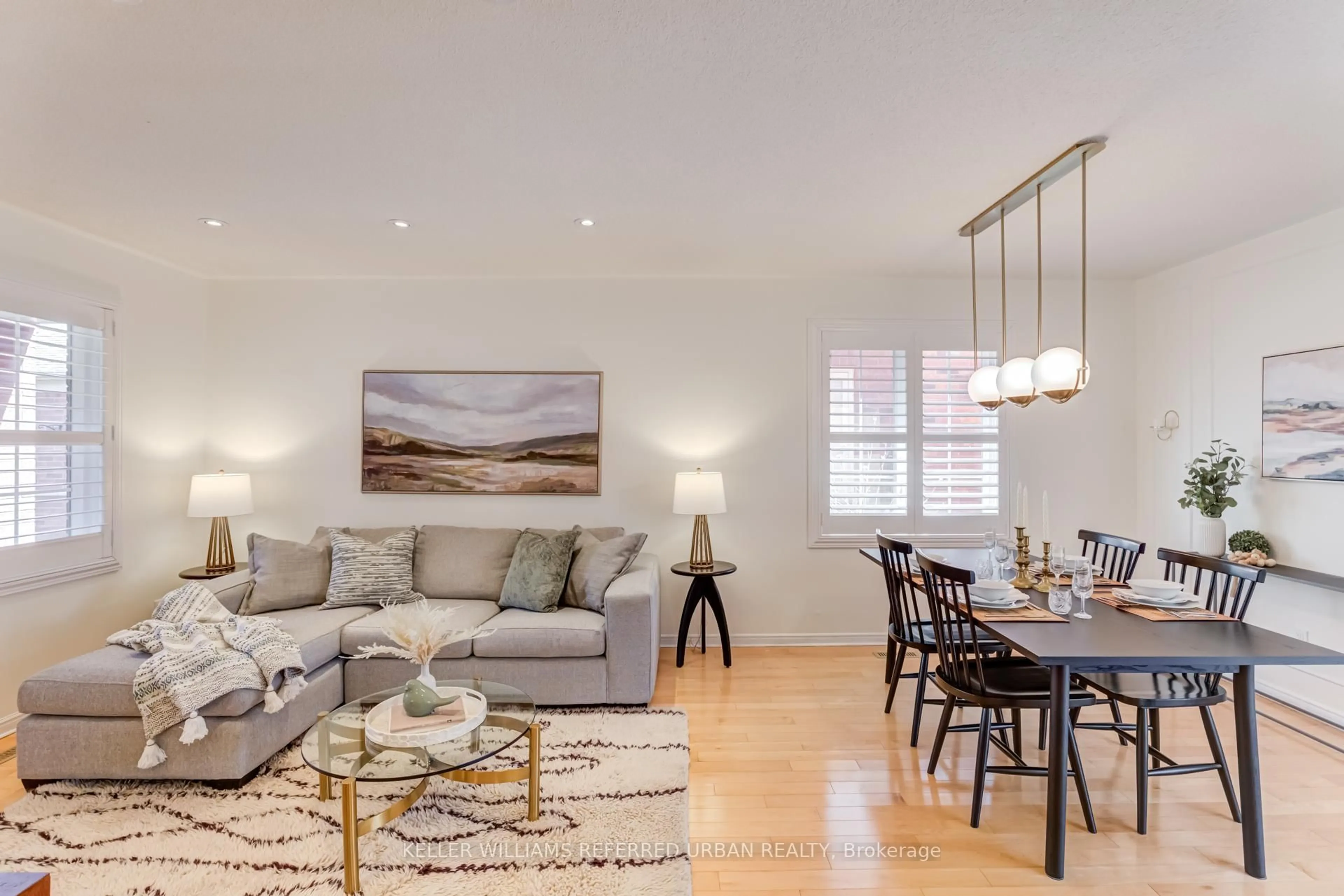 Living room with furniture, wood/laminate floor for 105 White Pine Cres, Pickering Ontario L1V 6S3