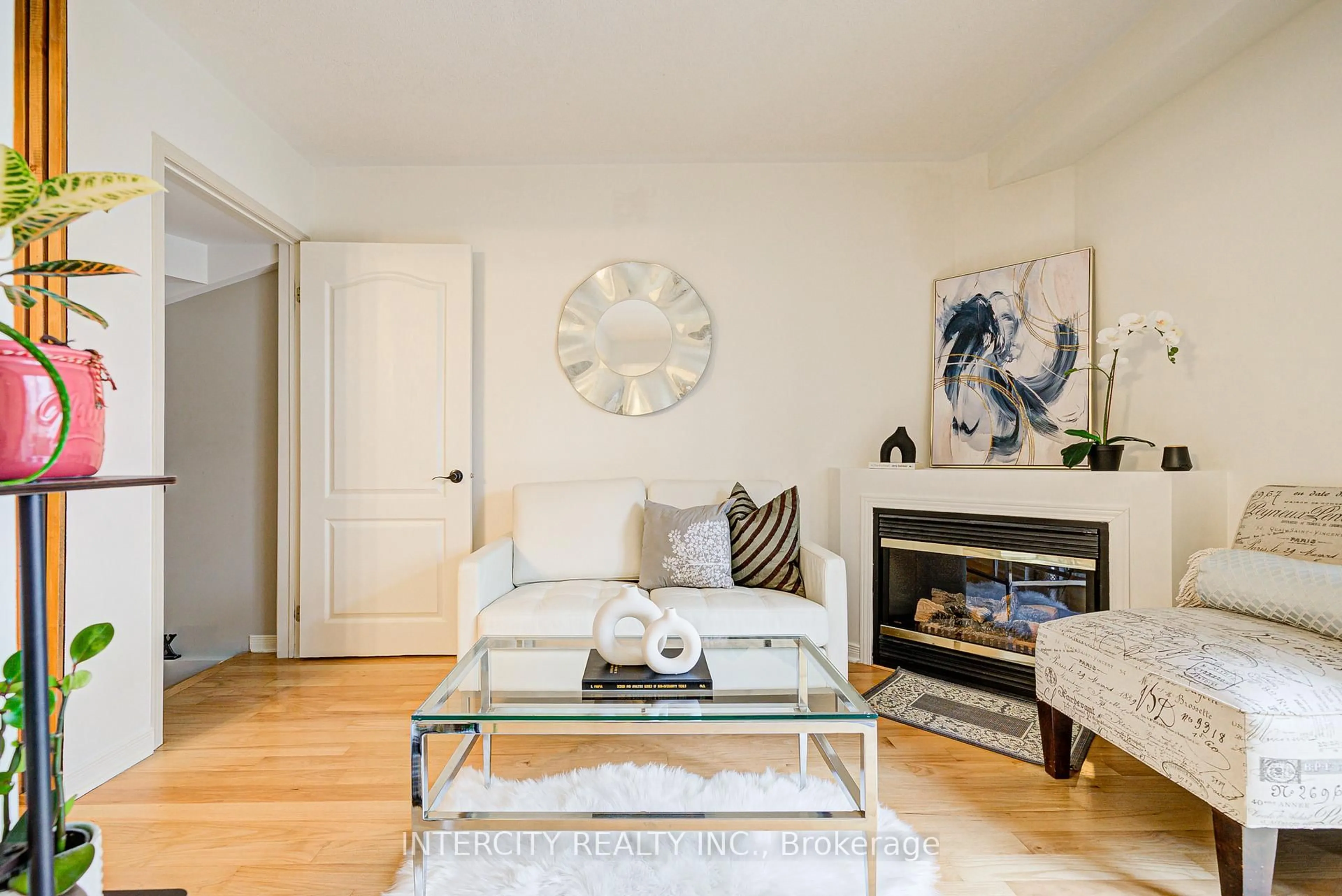 Living room with furniture, wood/laminate floor for 372 Sparrow Circ, Pickering Ontario L1V 7E7