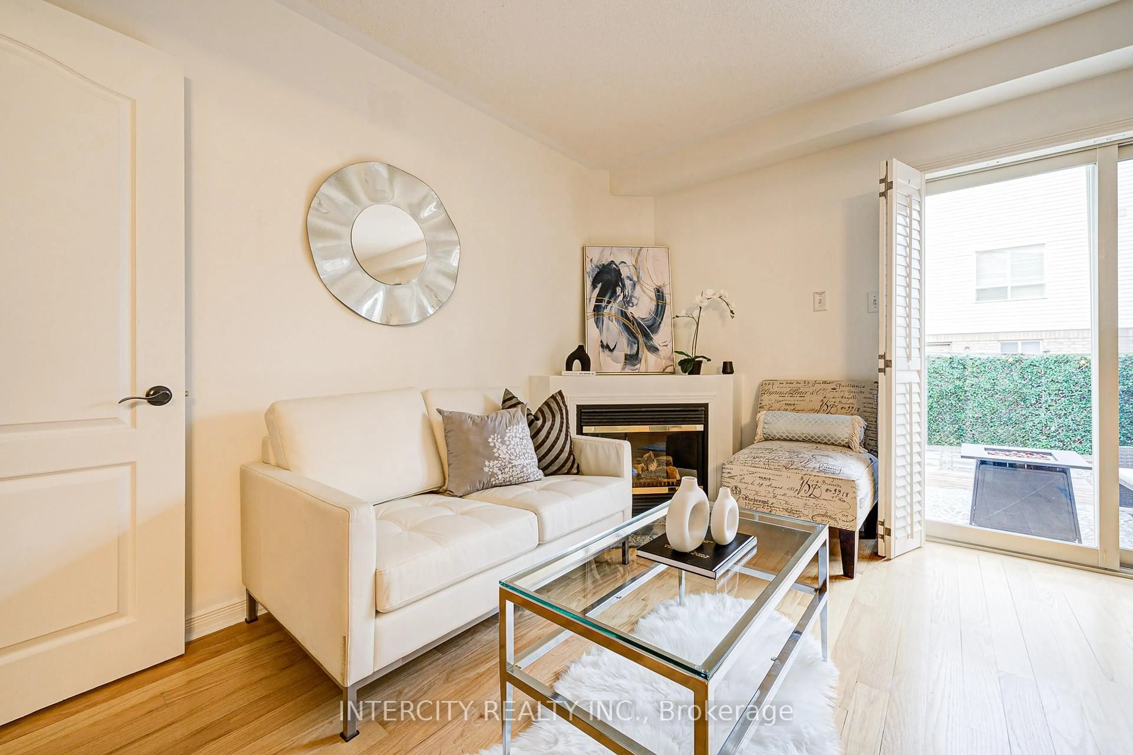 Living room with furniture, wood/laminate floor for 372 Sparrow Circ, Pickering Ontario L1V 7E7