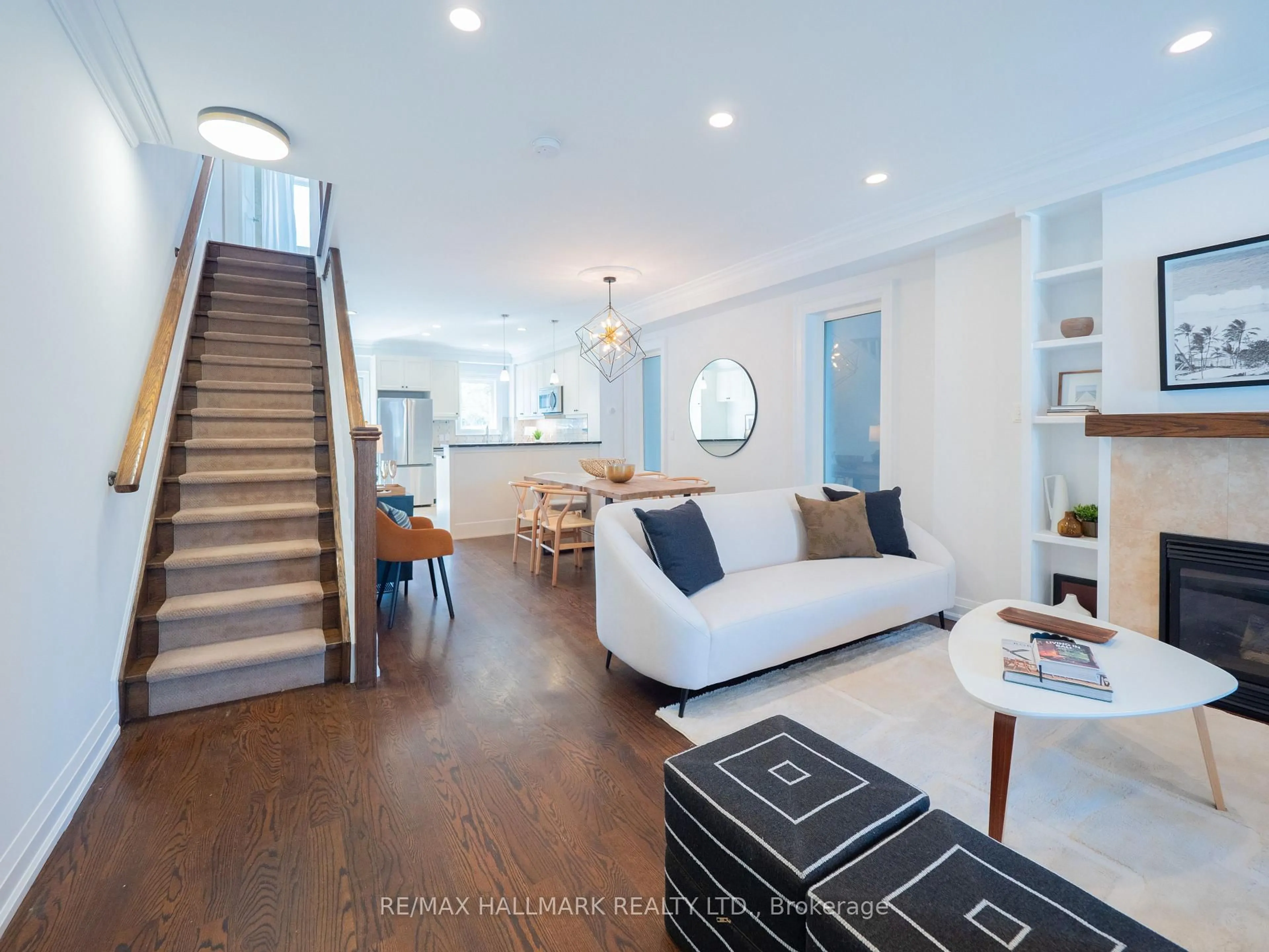 Living room with furniture, wood/laminate floor for 189 Riverdale Ave, Toronto Ontario M4K 1C4