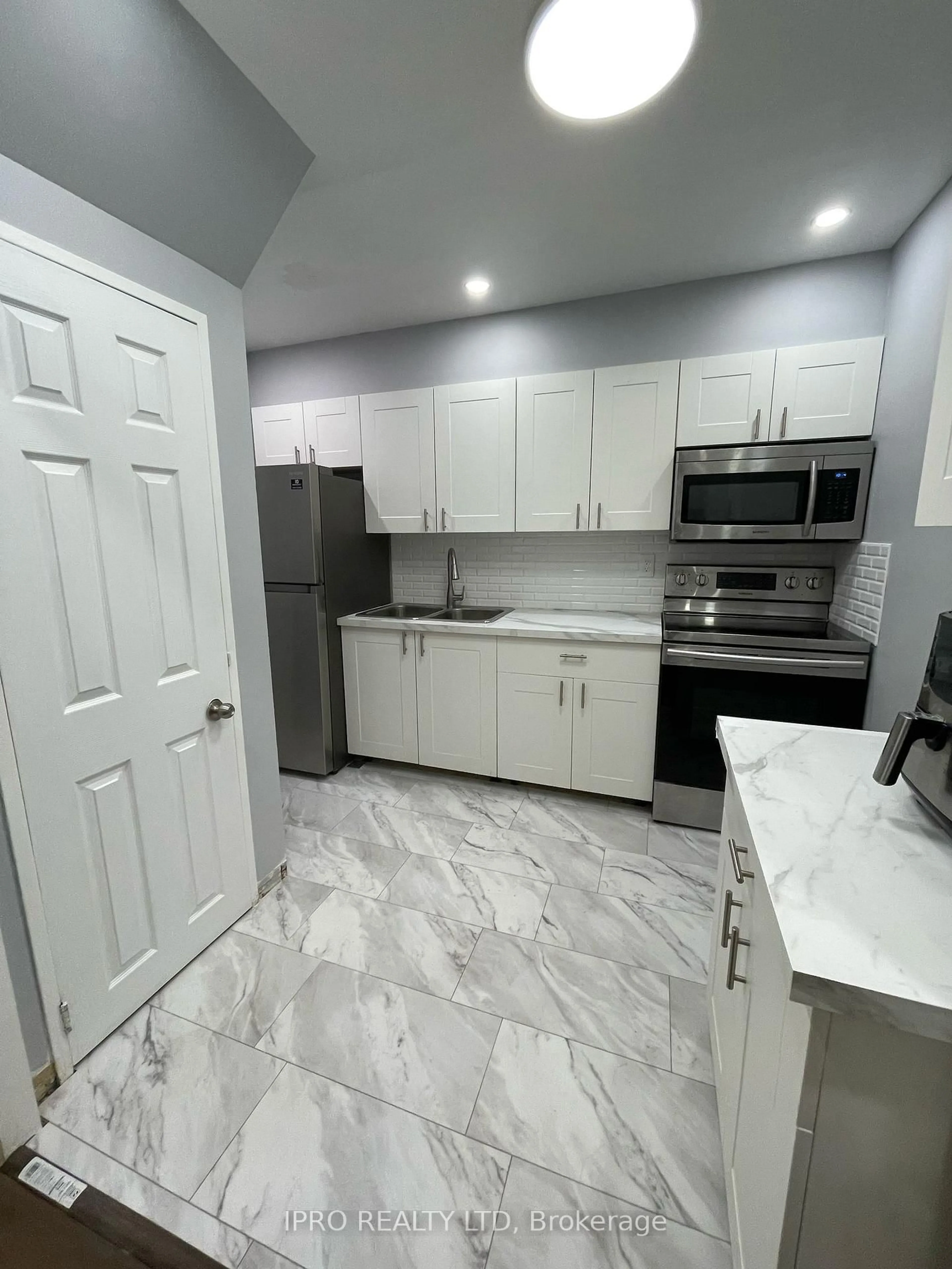 Standard kitchen, ceramic/tile floor for 100 Mornelle Crt #1034, Toronto Ontario M1E 4X2