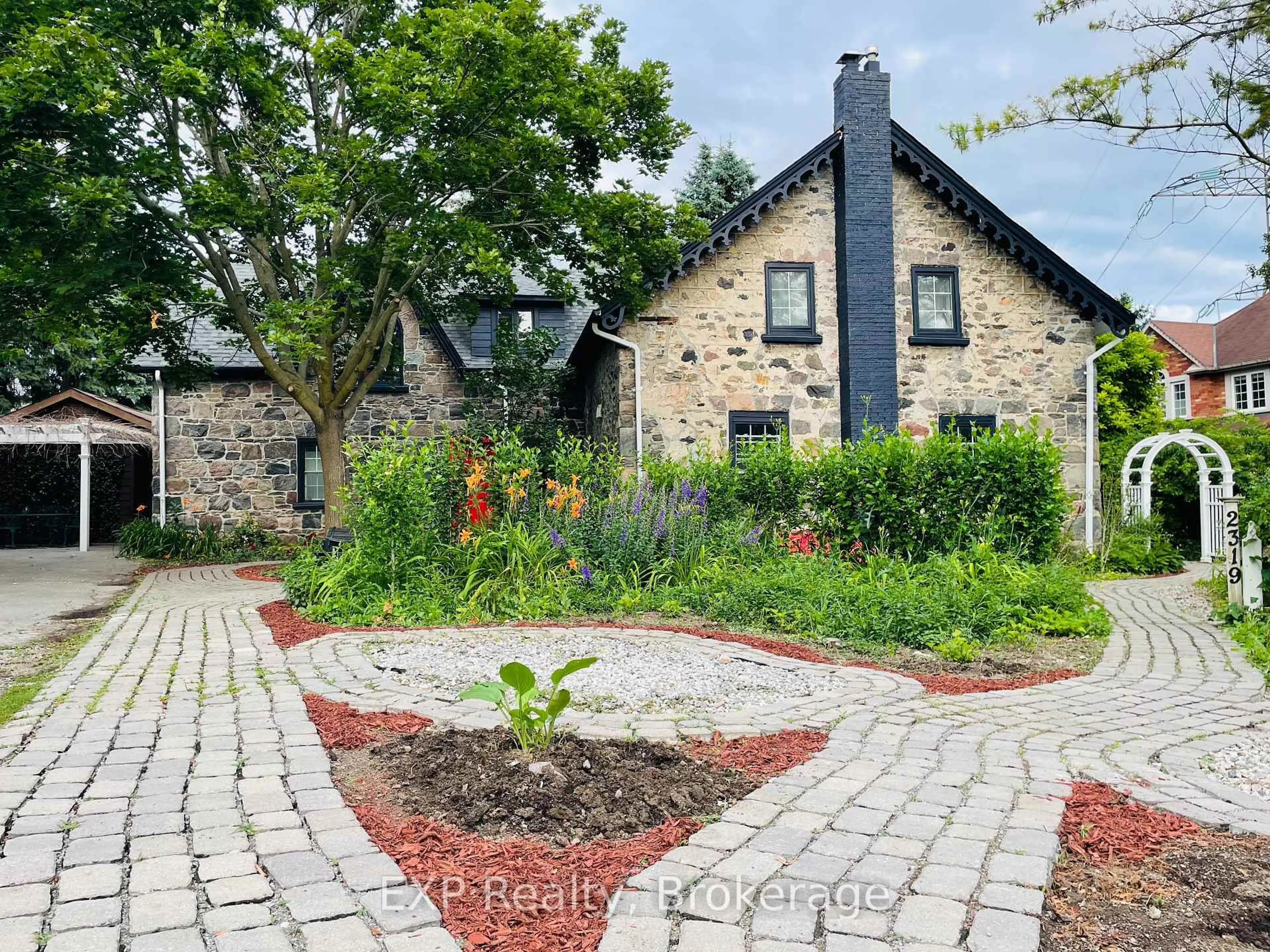 Home with brick exterior material, street for 2319 Wildwood Cres, Pickering Ontario L1X 2N1