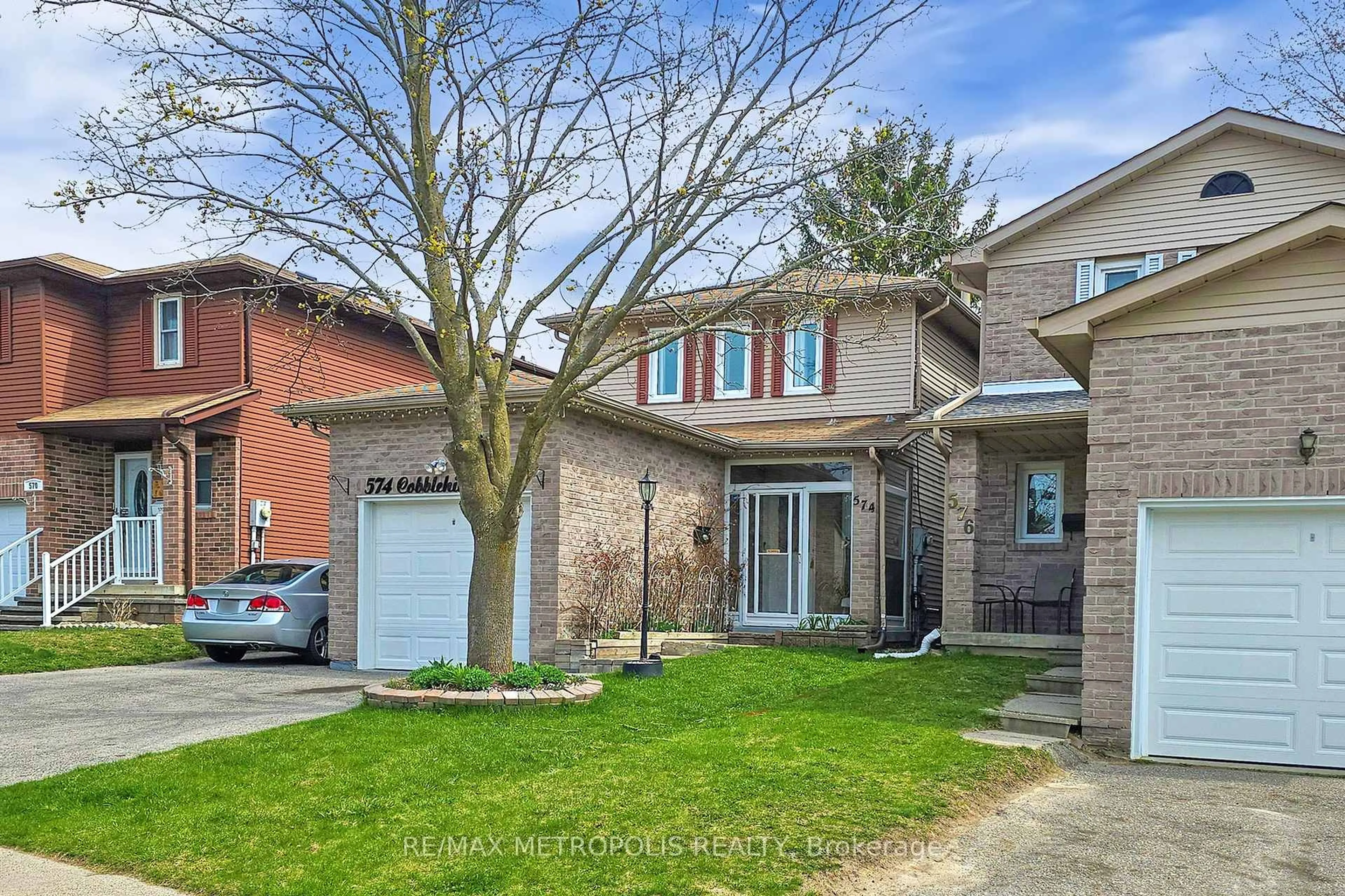 Home with brick exterior material, street for 574 Cobblehill Dr, Oshawa Ontario L1K 1R4