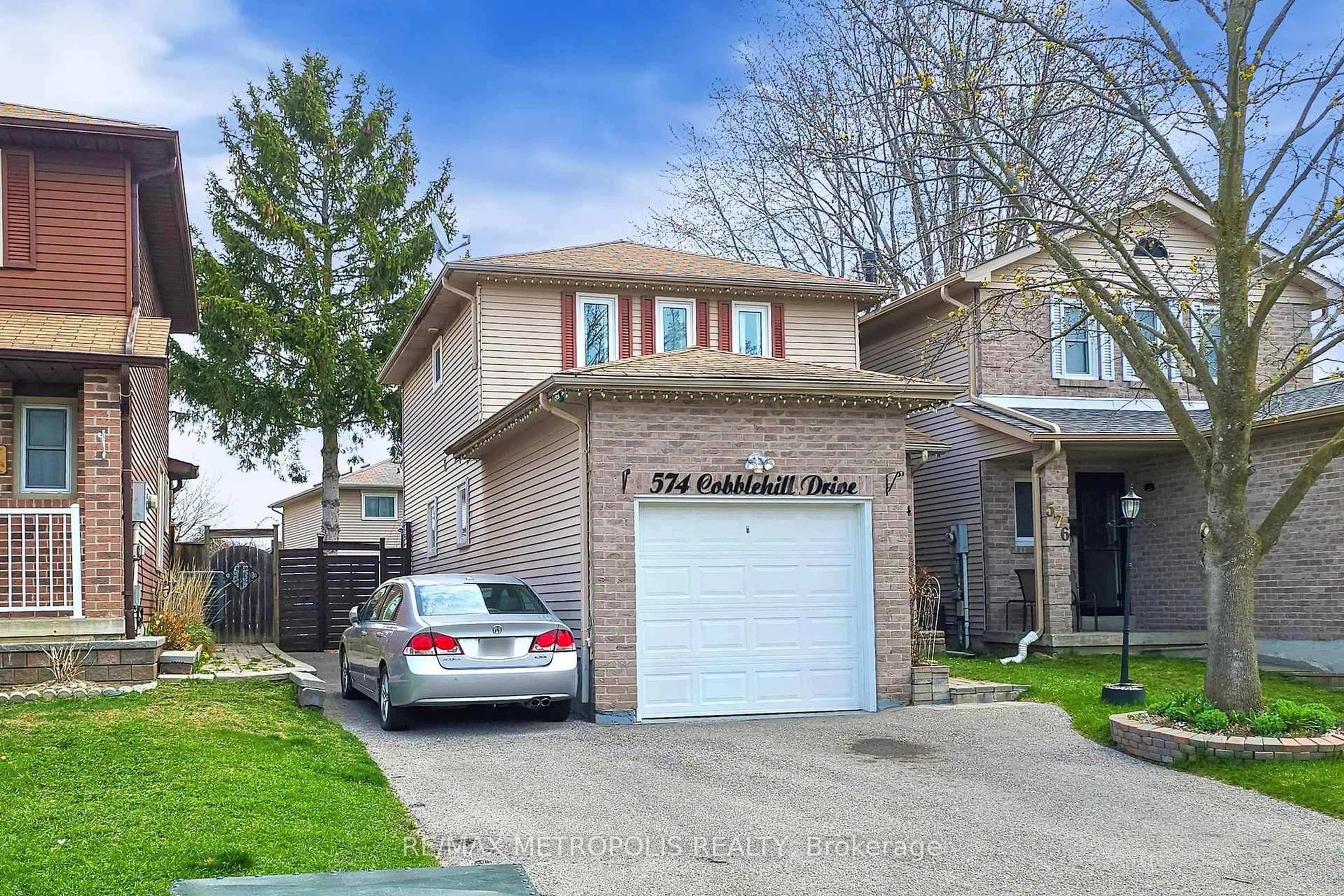 Home with brick exterior material, street for 574 Cobblehill Dr, Oshawa Ontario L1K 1R4