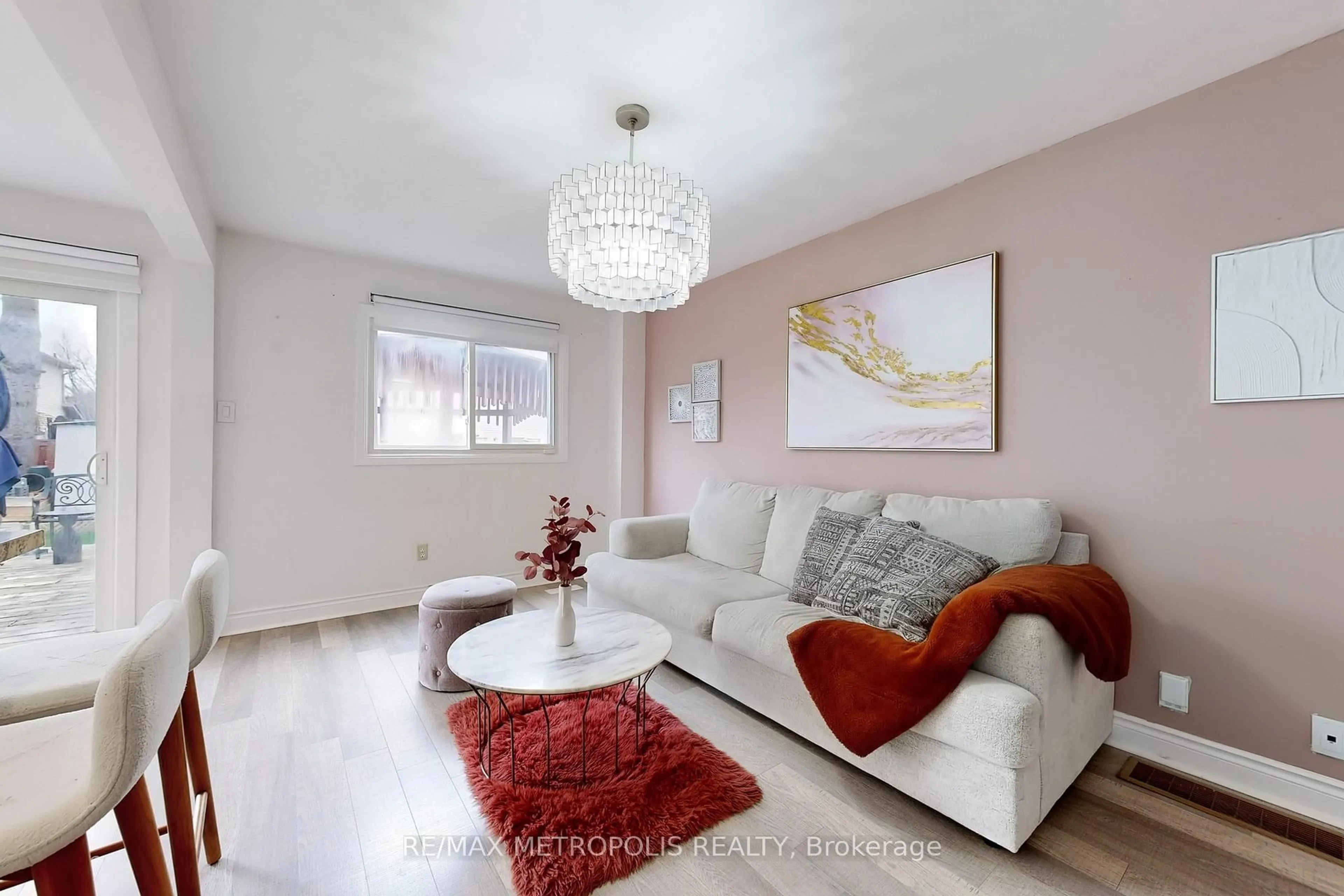 Living room with furniture, wood/laminate floor for 574 Cobblehill Dr, Oshawa Ontario L1K 1R4