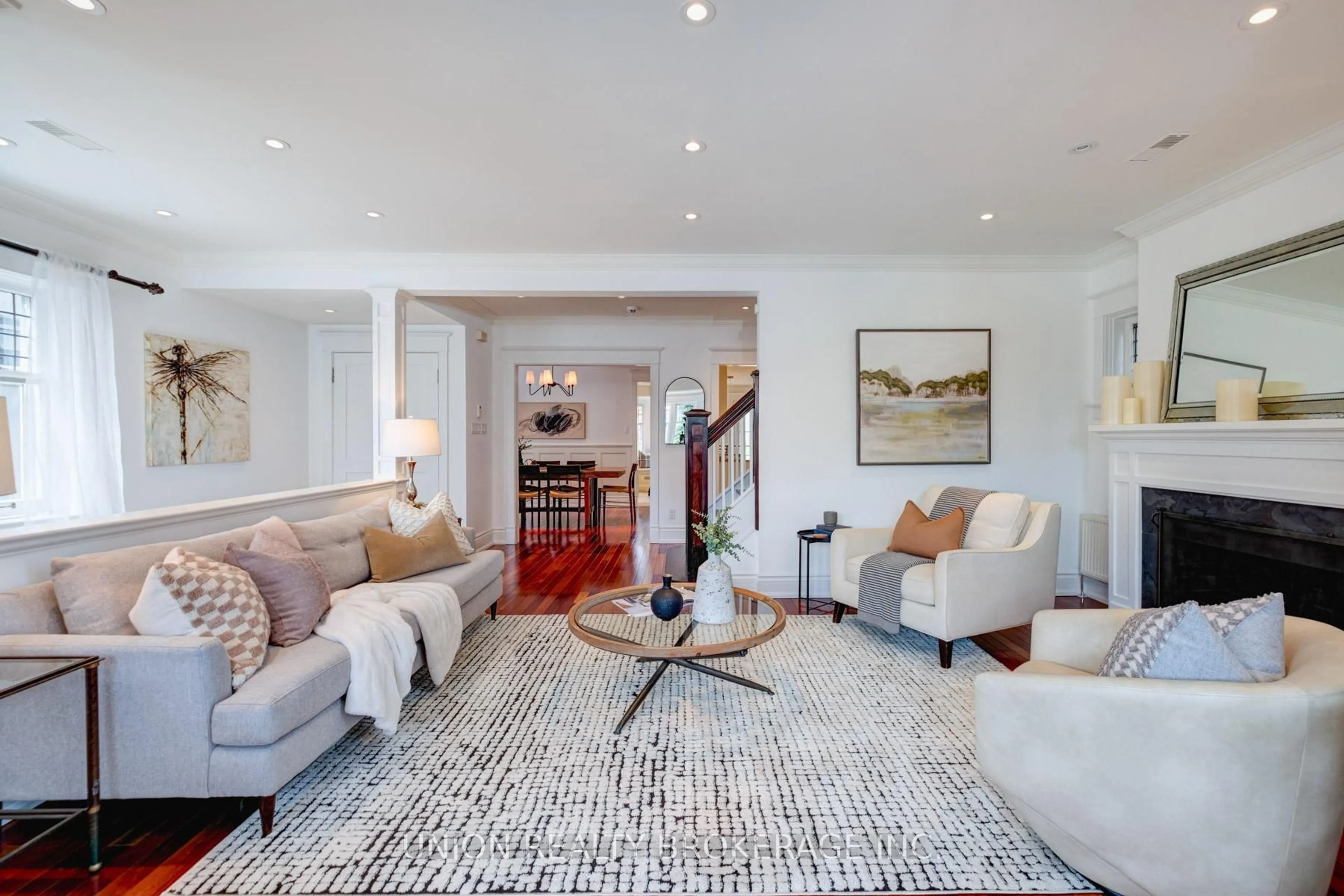 Living room with furniture, carpet floor for 28 Cavendish St, Toronto Ontario M4E 1P1