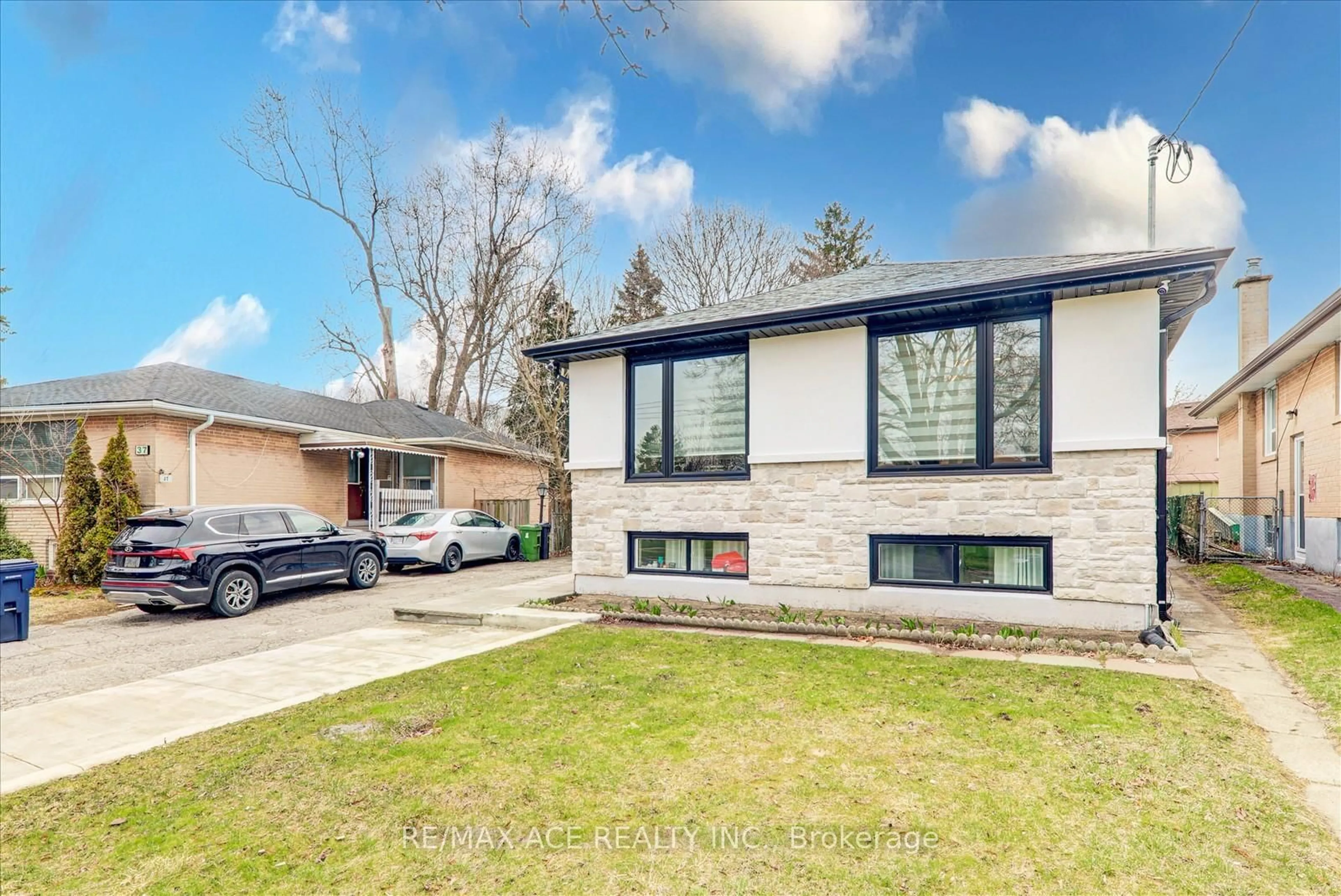 Home with brick exterior material, street for 35 Darlingside Dr, Toronto Ontario M1E 3N9