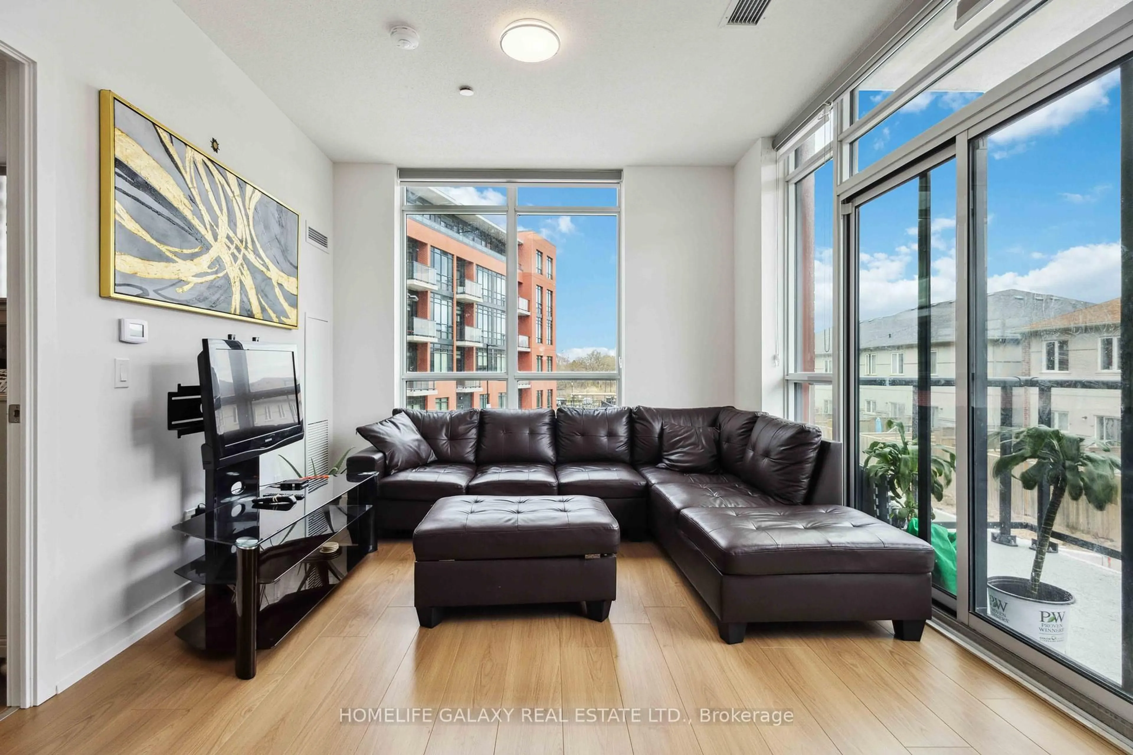 Living room with furniture, unknown for 1010 Dundas St #204, Whitby Ontario L1N 2K2