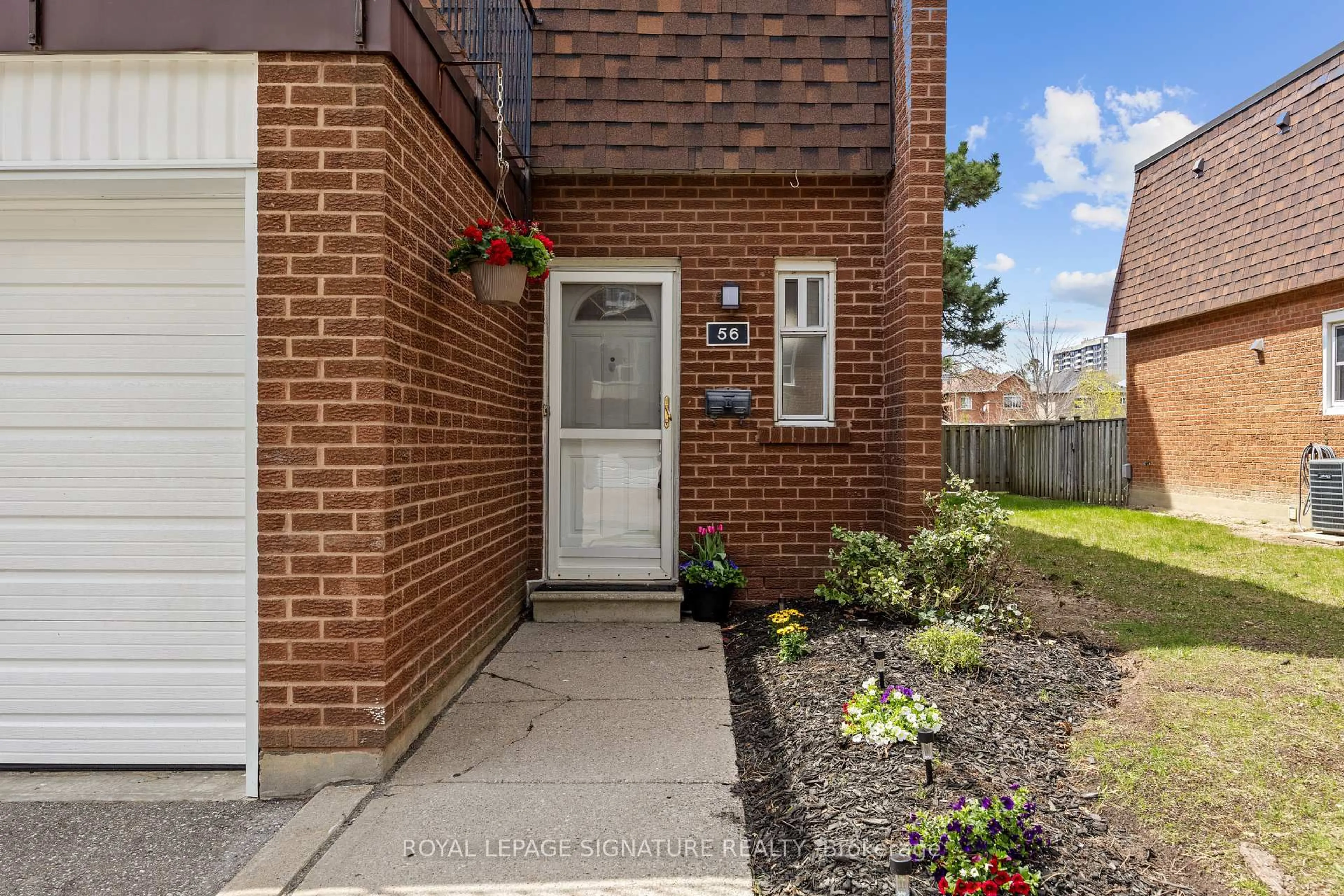 Home with brick exterior material, street for 100 Bridletowne Circ #56, Toronto Ontario M1W 2G8