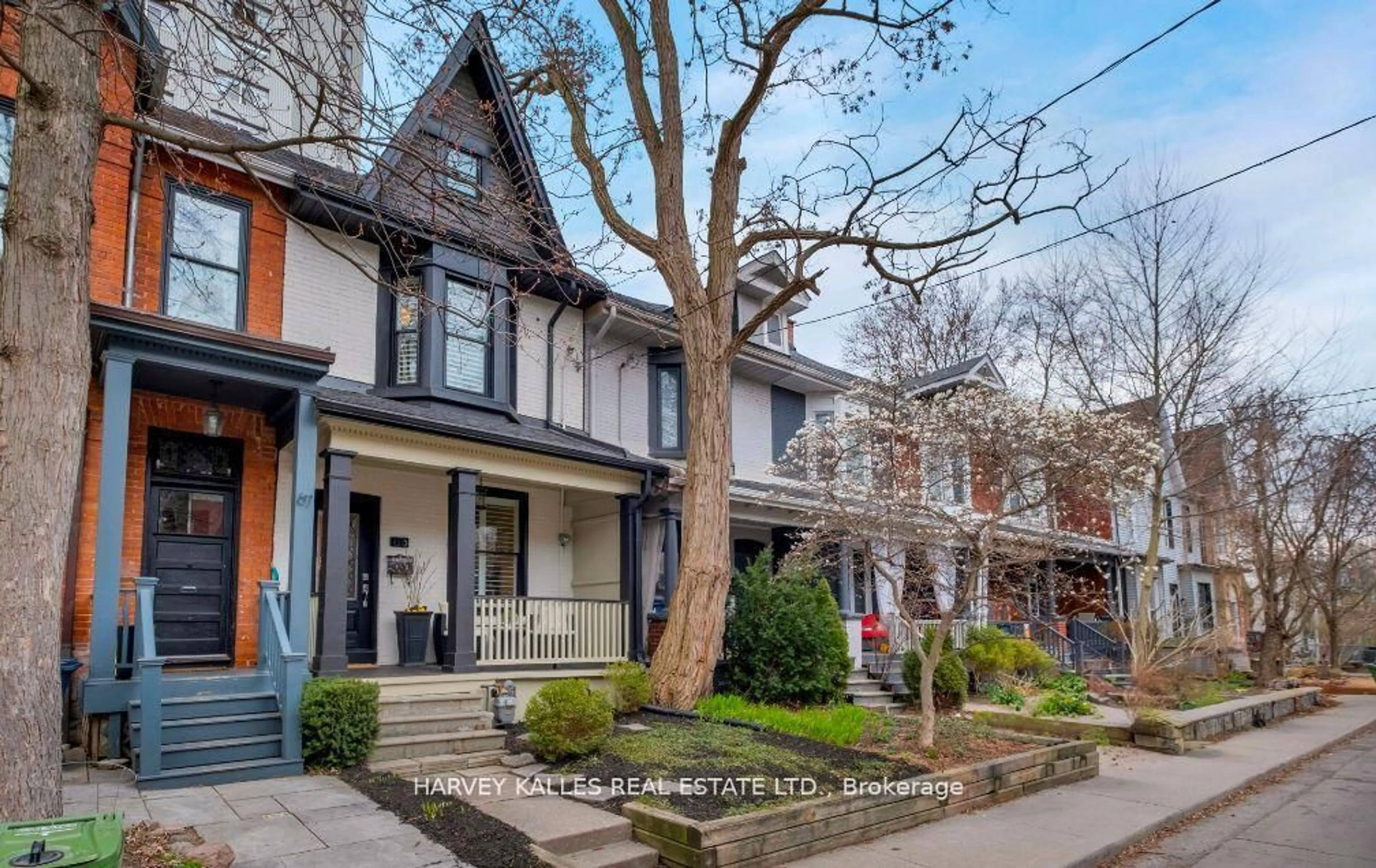 Home with brick exterior material, street for 65 Tiverton Ave, Toronto Ontario M4M 2M1