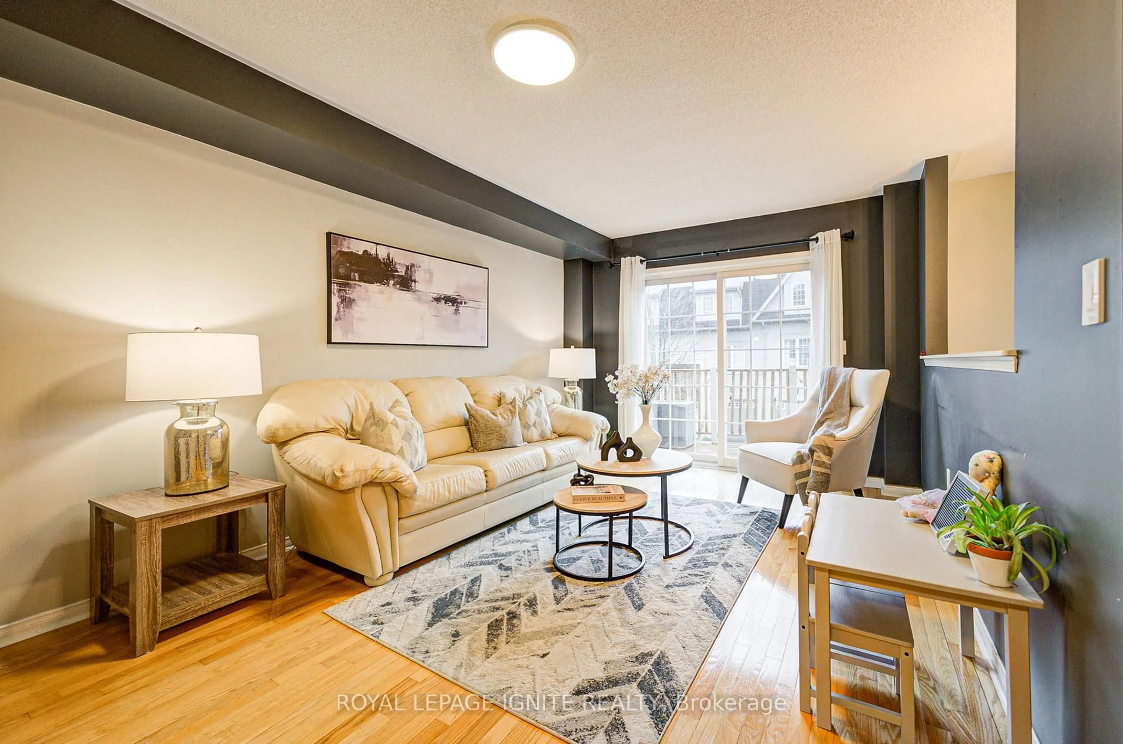 Living room with furniture, wood/laminate floor for 735 Sheppard Ave #17, Pickering Ontario L1V 7K5