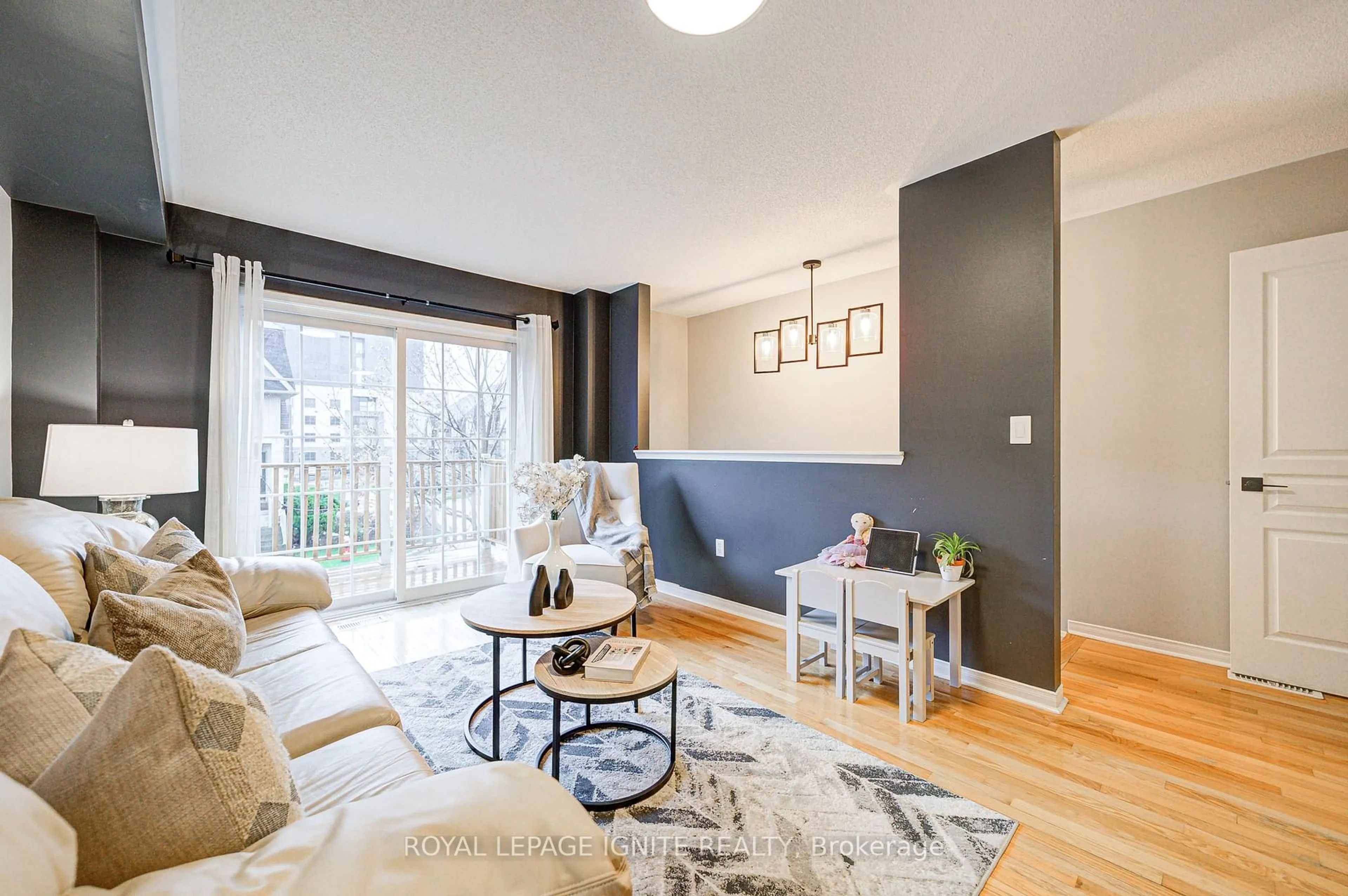 Living room with furniture, wood/laminate floor for 735 Sheppard Ave #17, Pickering Ontario L1V 7K5