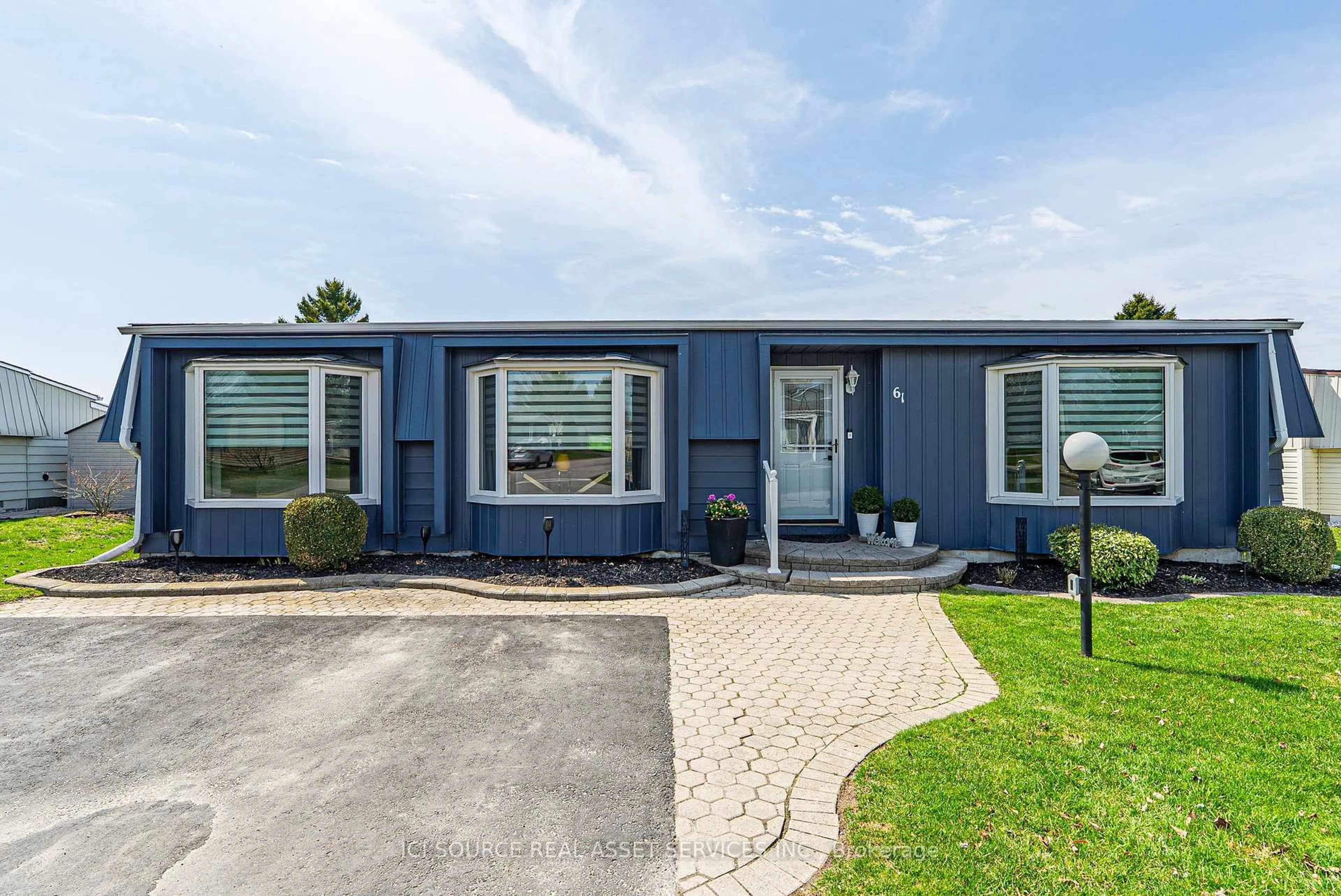 Home with vinyl exterior material, street for 61 The Cove Rd, Clarington Ontario L1B 1B2