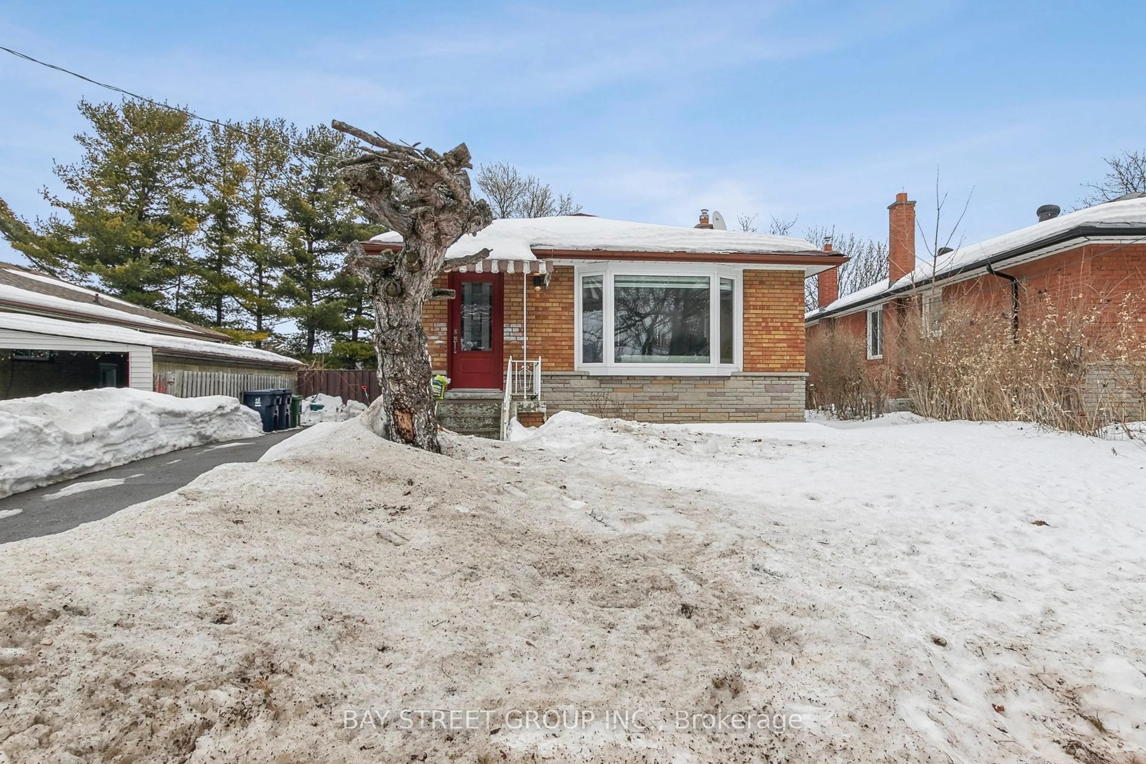 Home with brick exterior material, street for 9 Millmere Dr, Toronto Ontario M1G 2A9