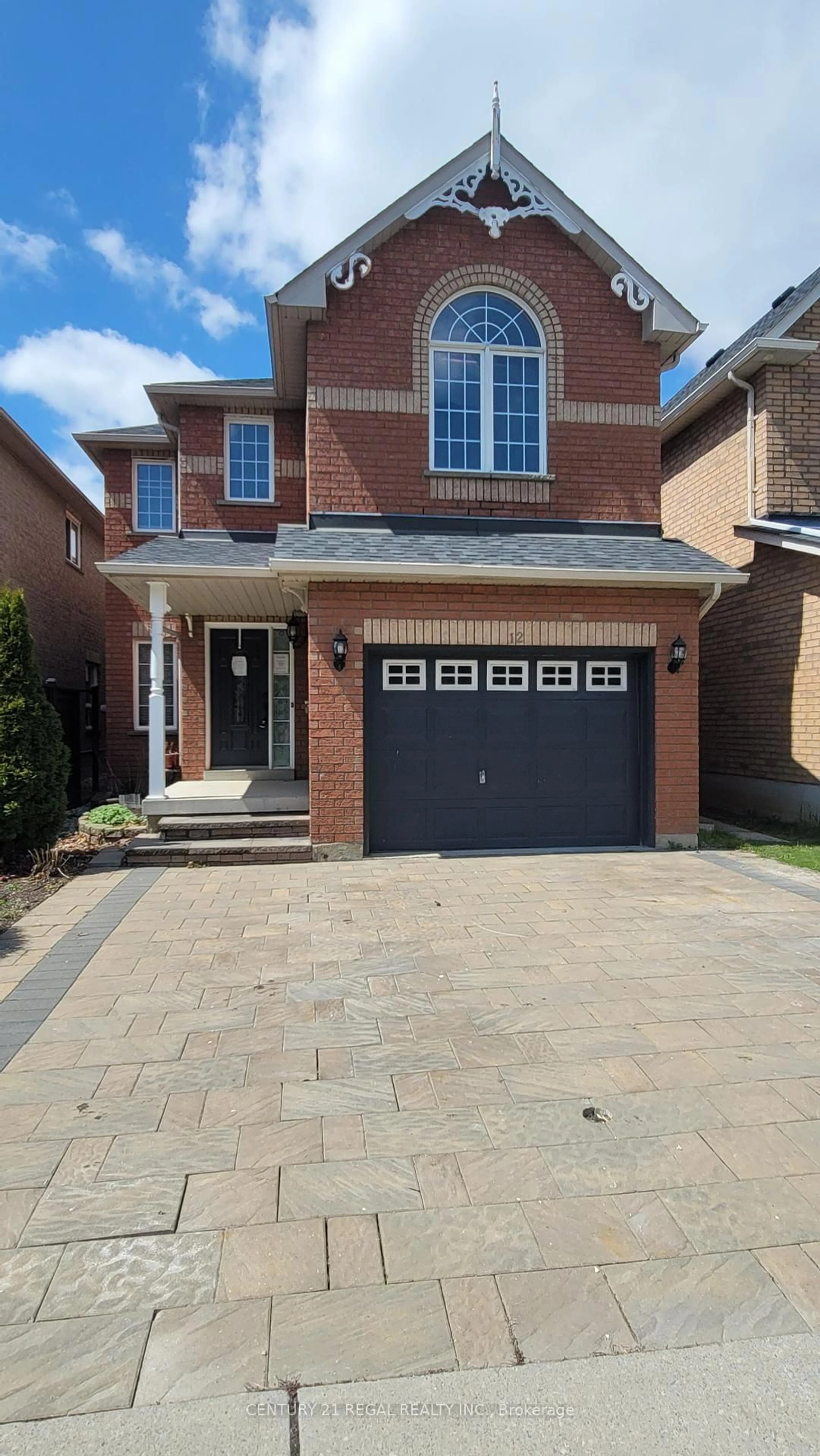 Home with brick exterior material, street for 12 Salt Dr, Ajax Ontario L1S 7P3
