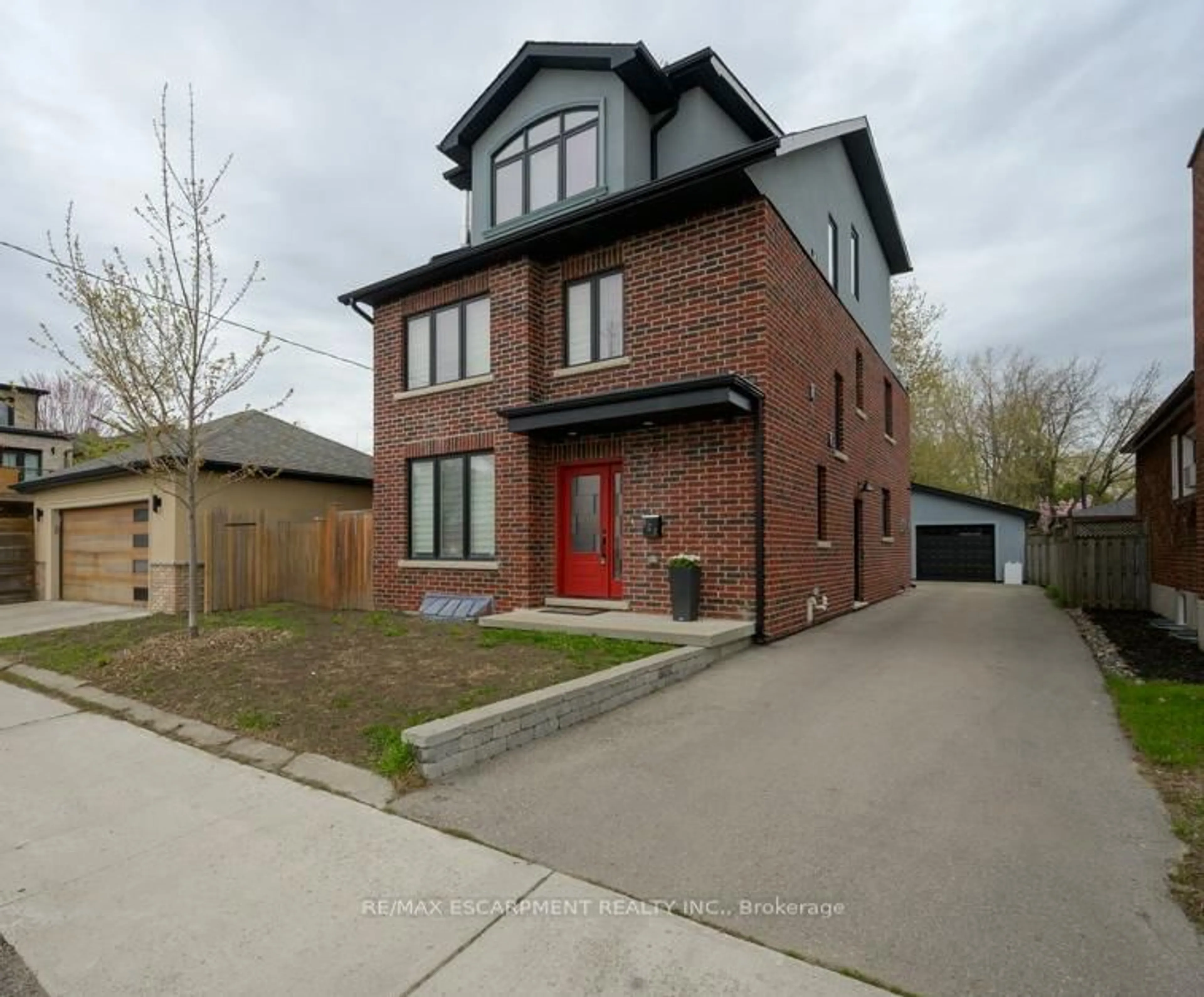 Home with brick exterior material, street for 820 Cosburn Ave, Toronto Ontario M4C 2W1