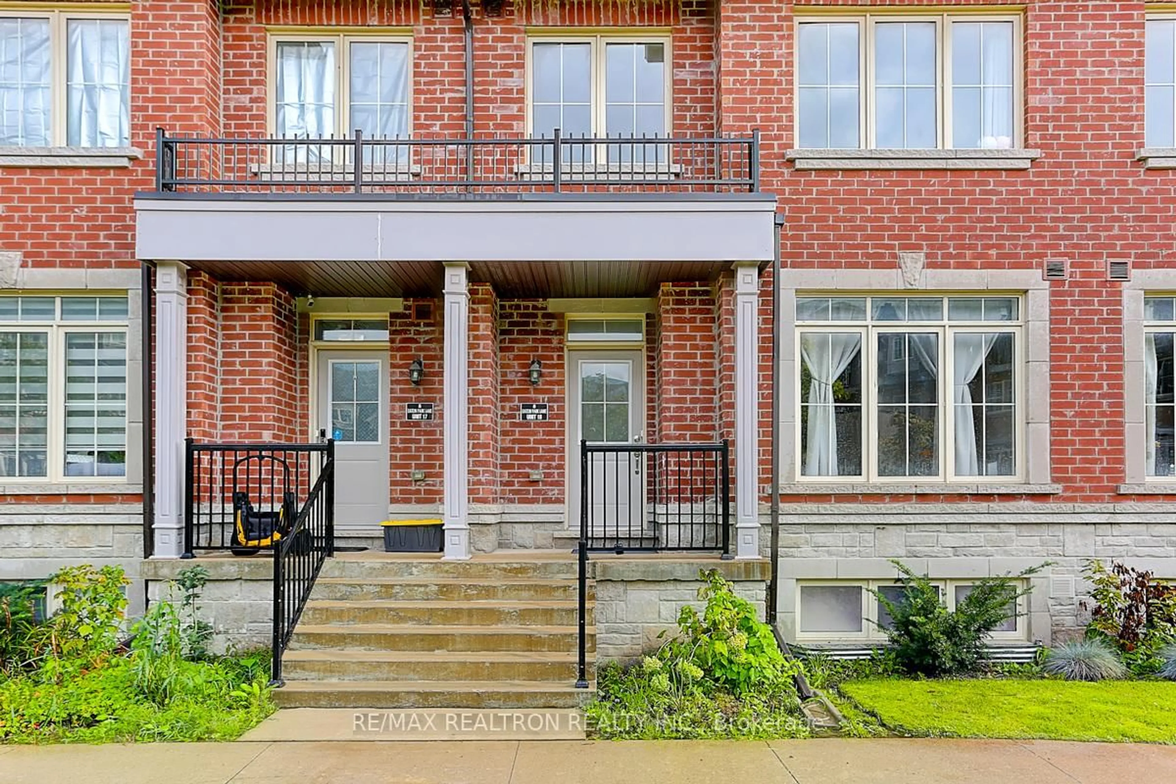 Home with brick exterior material, street for 8 Eaton Park Lane #18, Toronto Ontario M1W 0A5