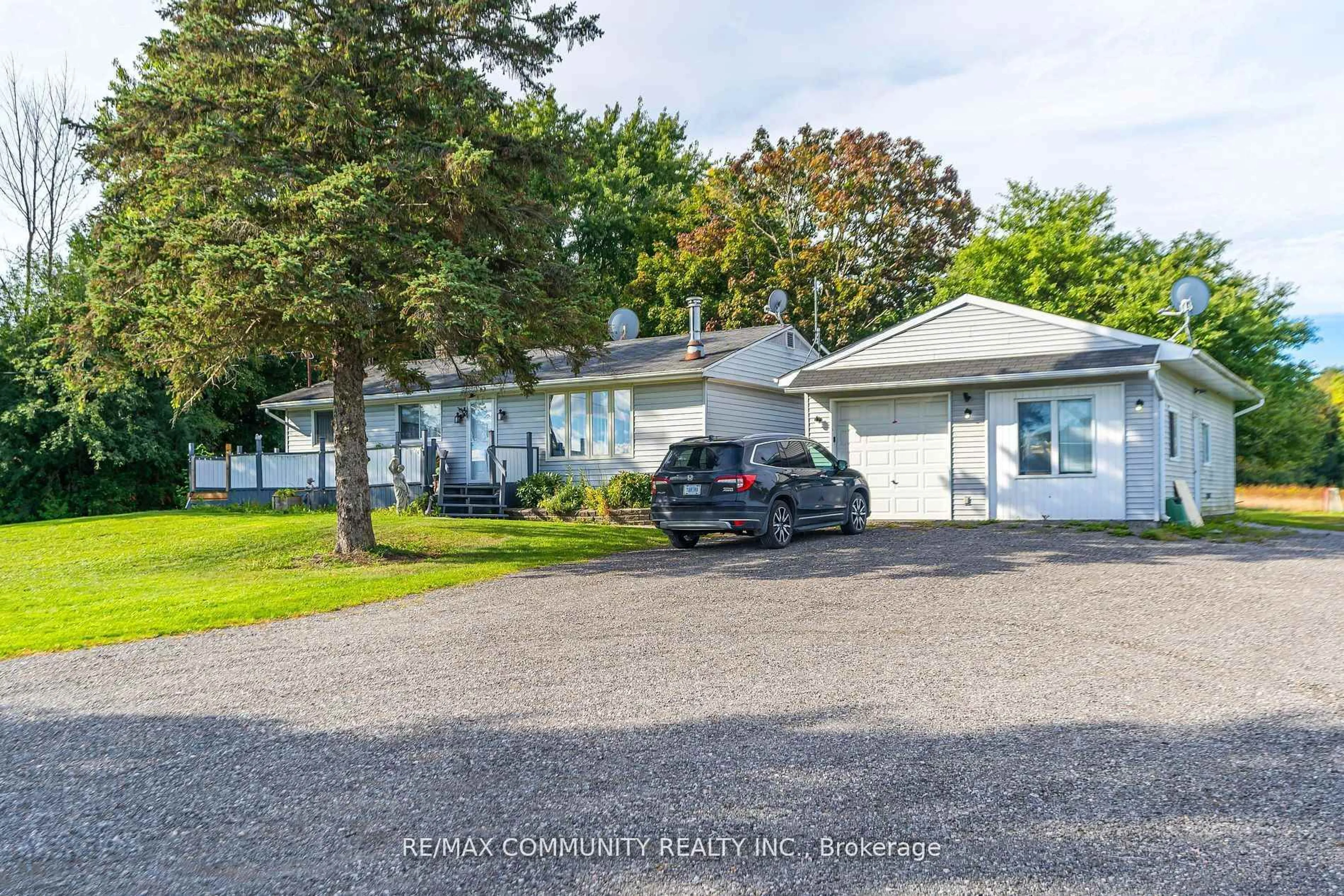 A pic from outside/outdoor area/front of a property/back of a property/a pic from drone, street for 11490 Simcoe St, Scugog Ontario L9L 1B3