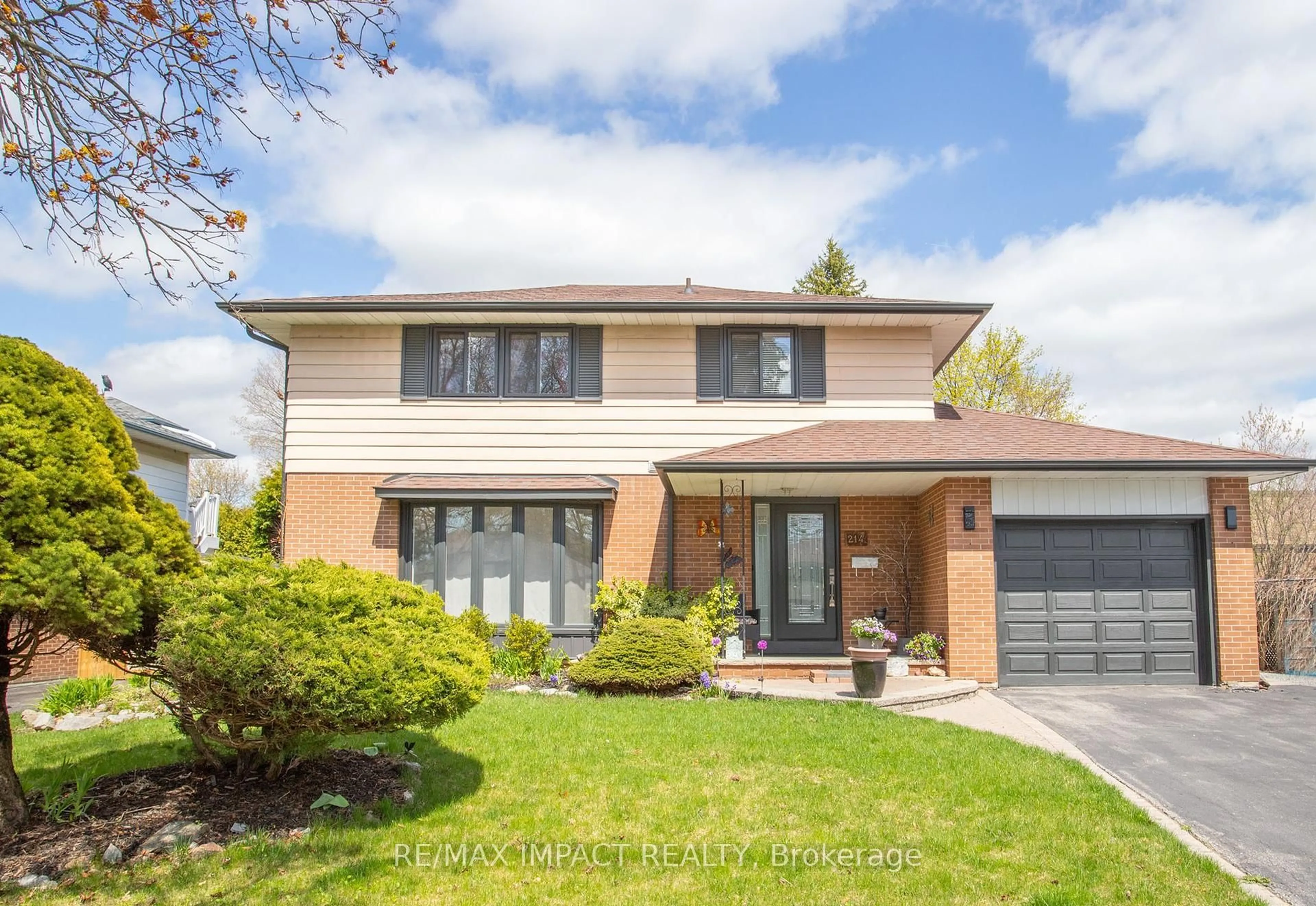 Home with brick exterior material, street for 214 Marigold Ave, Oshawa Ontario L1G 3G3