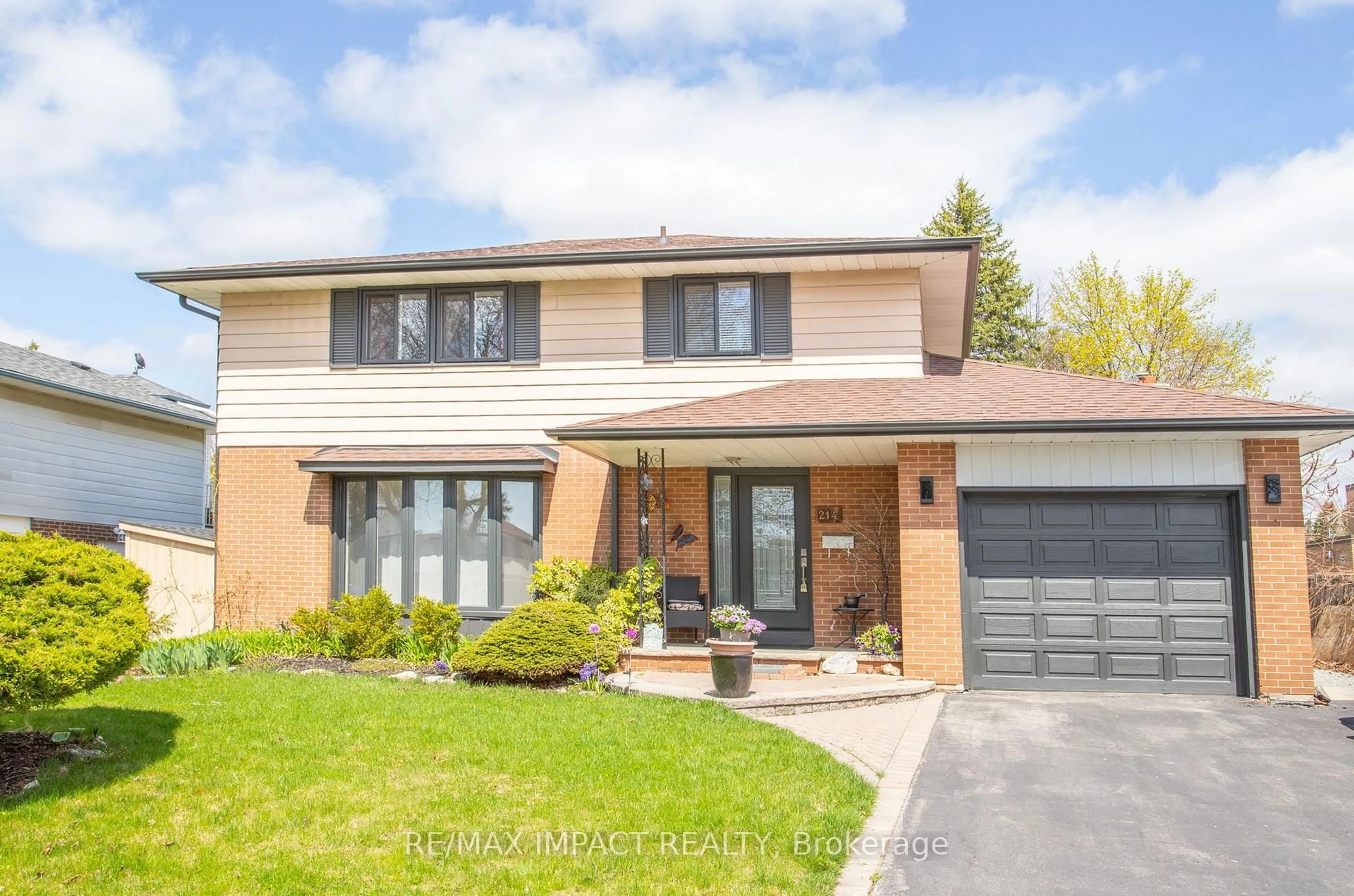 Home with brick exterior material, street for 214 Marigold Ave, Oshawa Ontario L1G 3G3