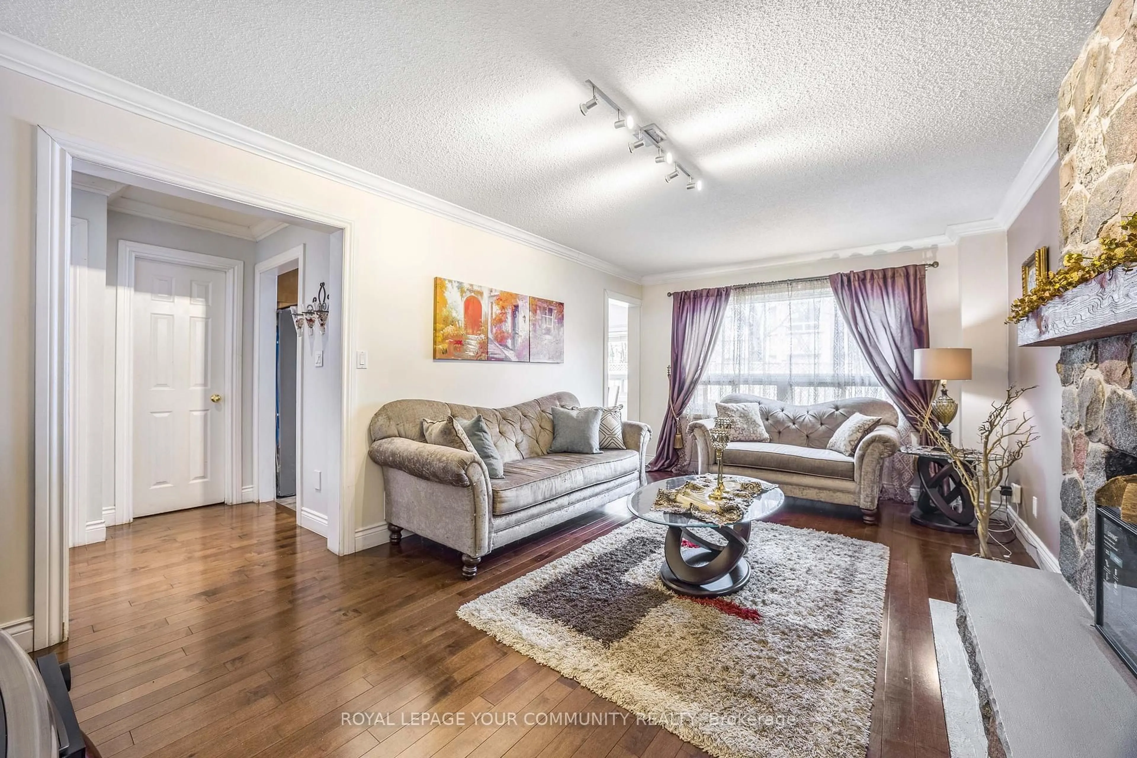 Living room with furniture, wood/laminate floor for 261 Hoover Dr, Pickering Ontario L1V 5R9