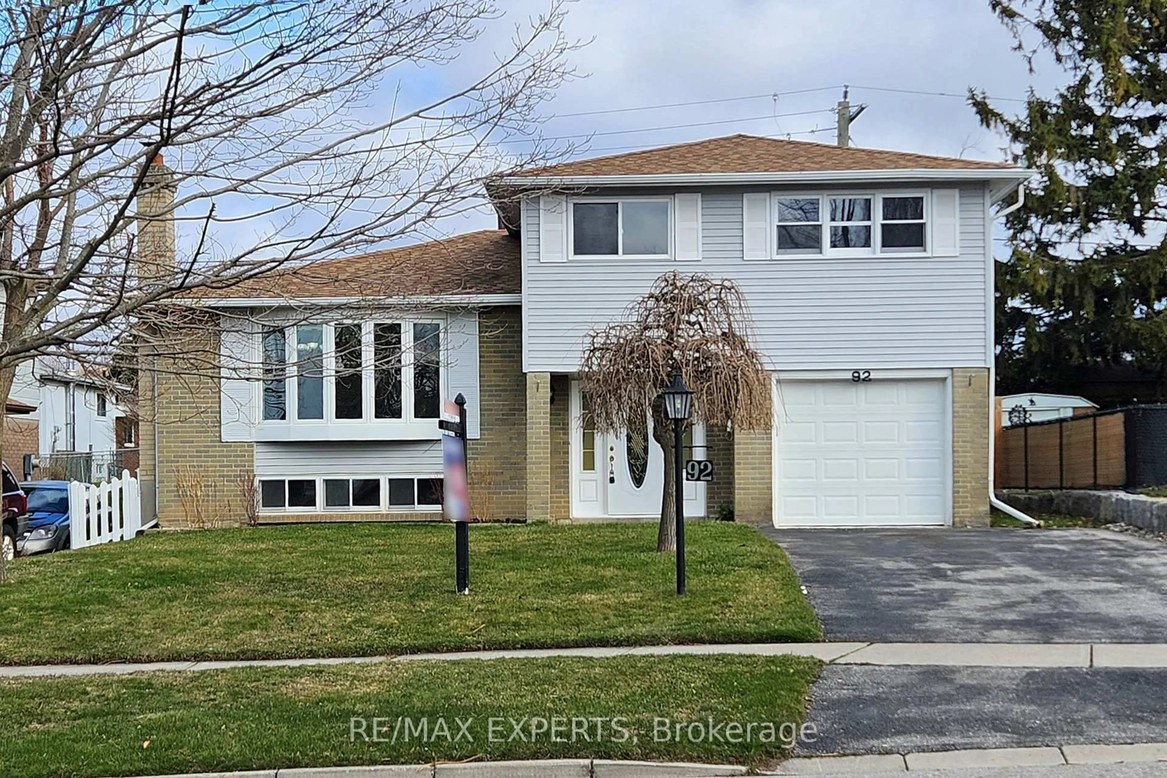 Home with vinyl exterior material, street for 92 Clover Ridge Dr, Ajax Ontario L1S 1G7