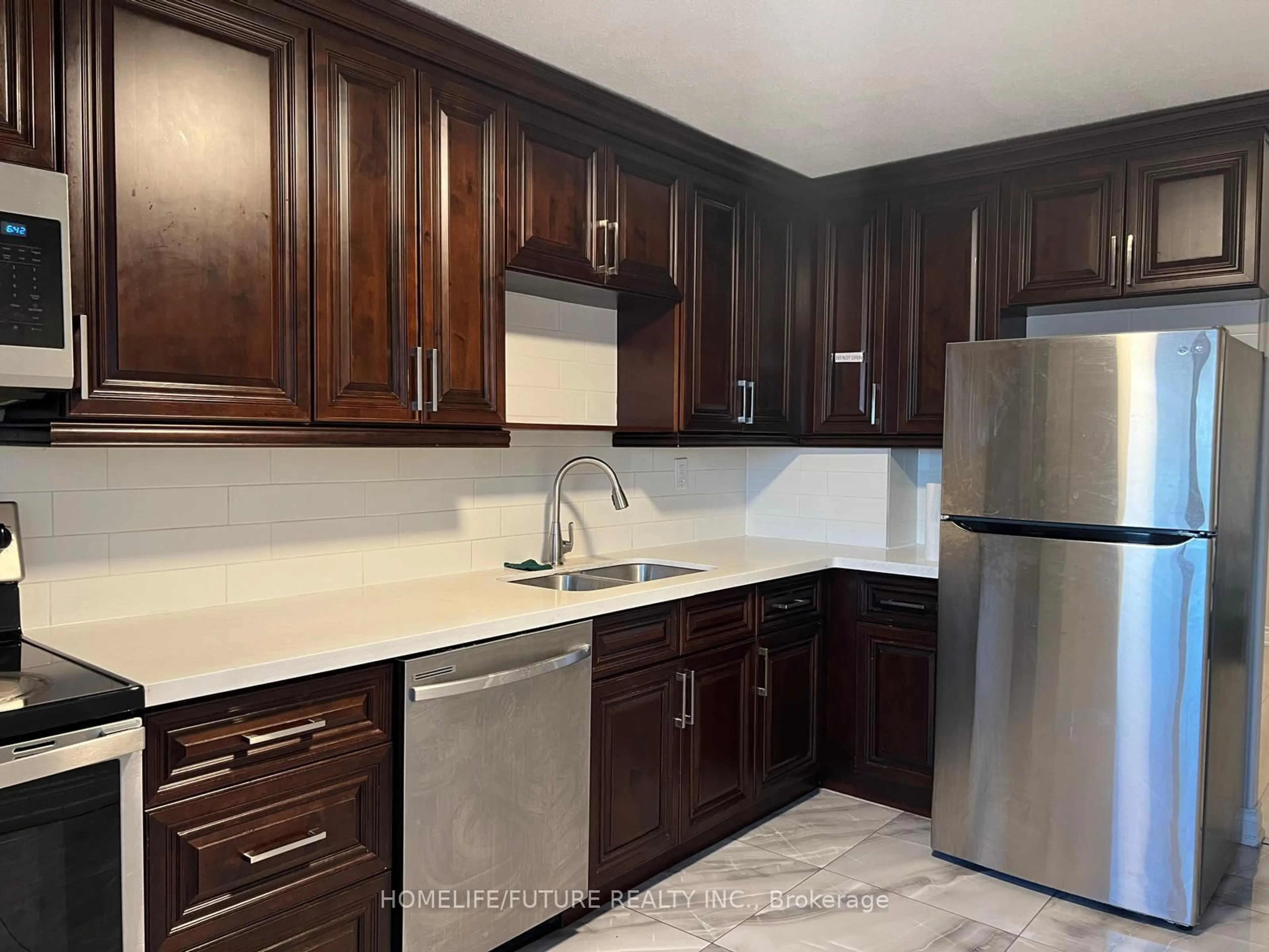 Standard kitchen, unknown for 100 Wingarden Crt #1510, Toronto Ontario M1B 2P4