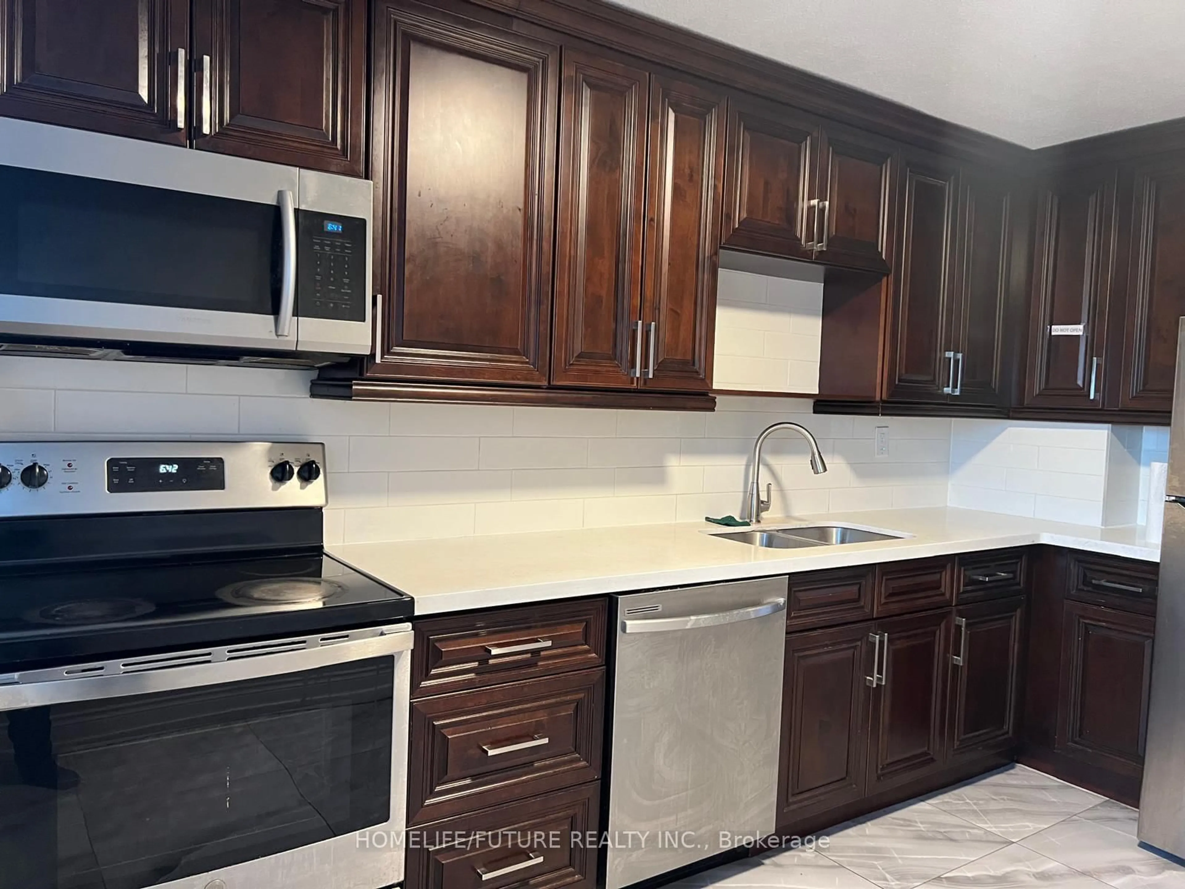 Standard kitchen, unknown for 100 Wingarden Crt #1510, Toronto Ontario M1B 2P4