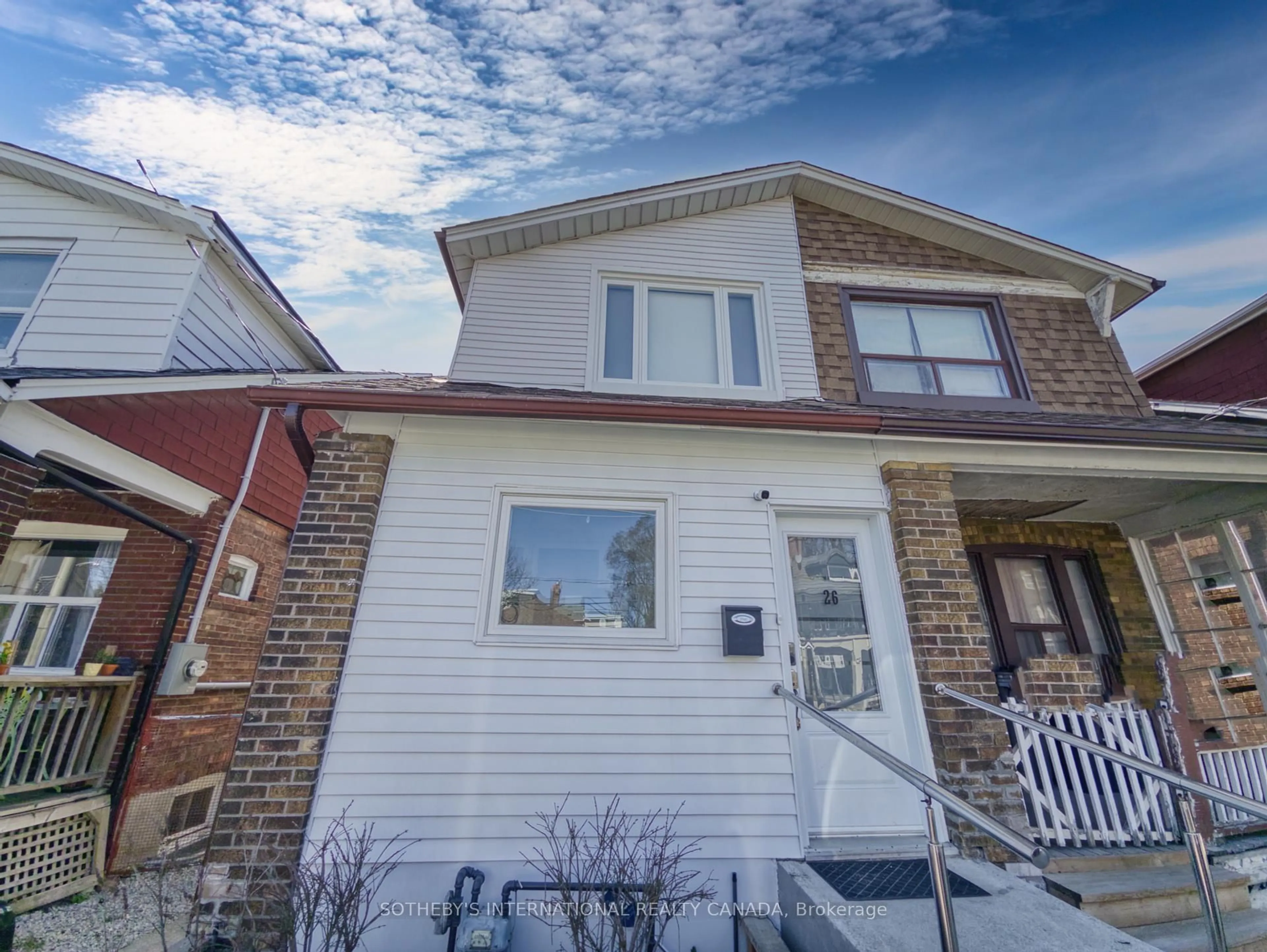 Home with vinyl exterior material, street for 26 Greenwood Ave, Toronto Ontario M4L 2P4