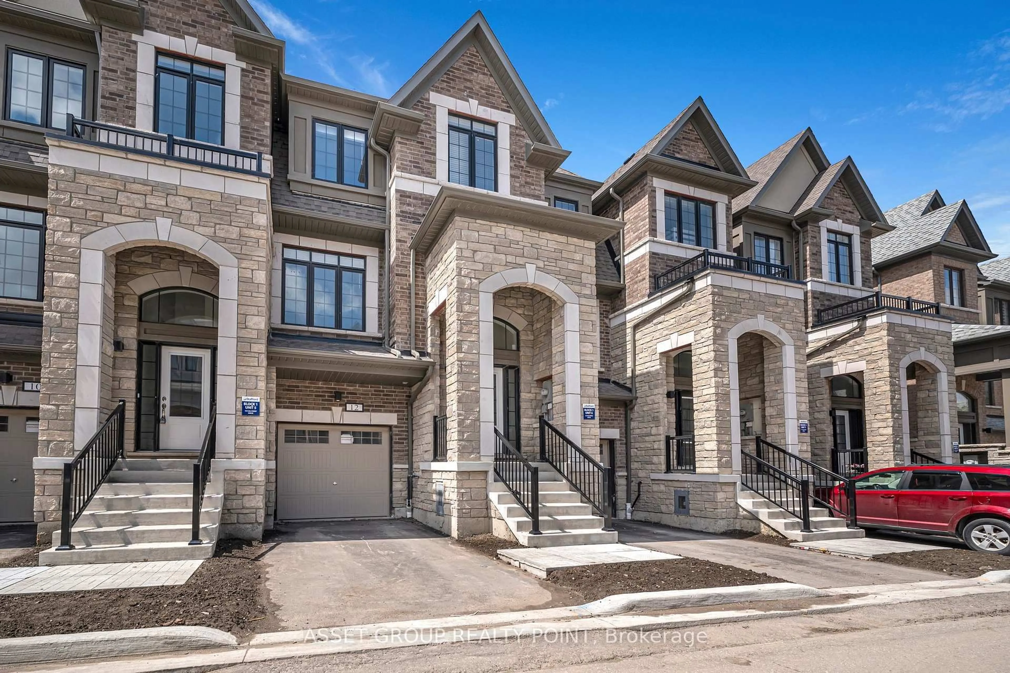 Home with brick exterior material, street for 12 Calloway Way, Whitby Ontario L1N 0N9