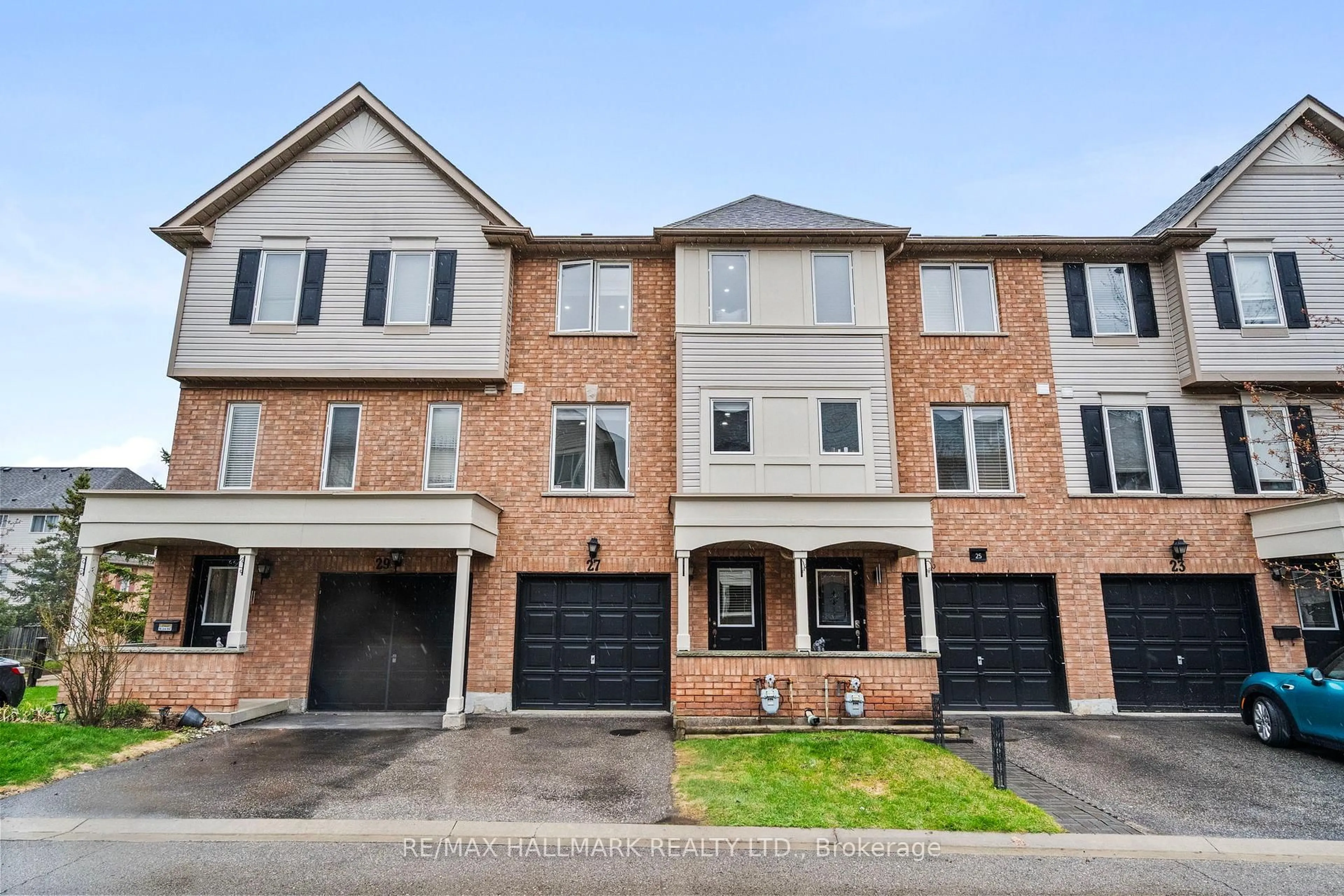 Home with brick exterior material, street for 27 McGonigal Lane, Ajax Ontario L1T 4H1