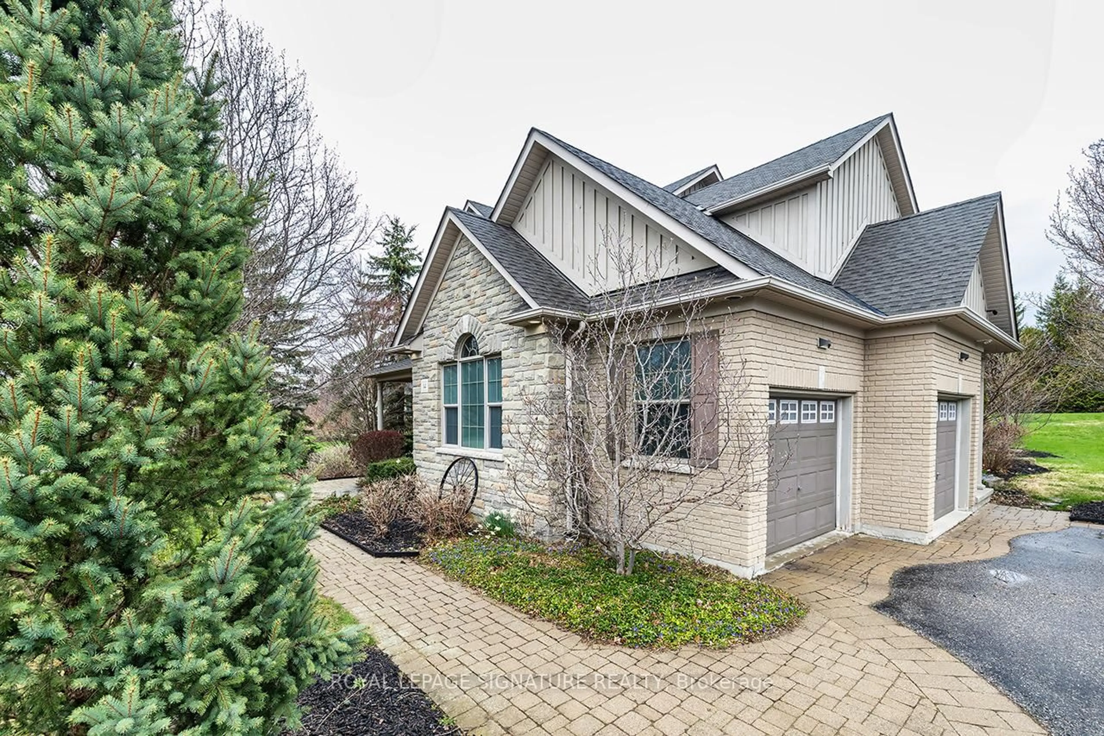 Home with brick exterior material, street for 14 Richard Butler Dr, Whitby Ontario L0B 1A0